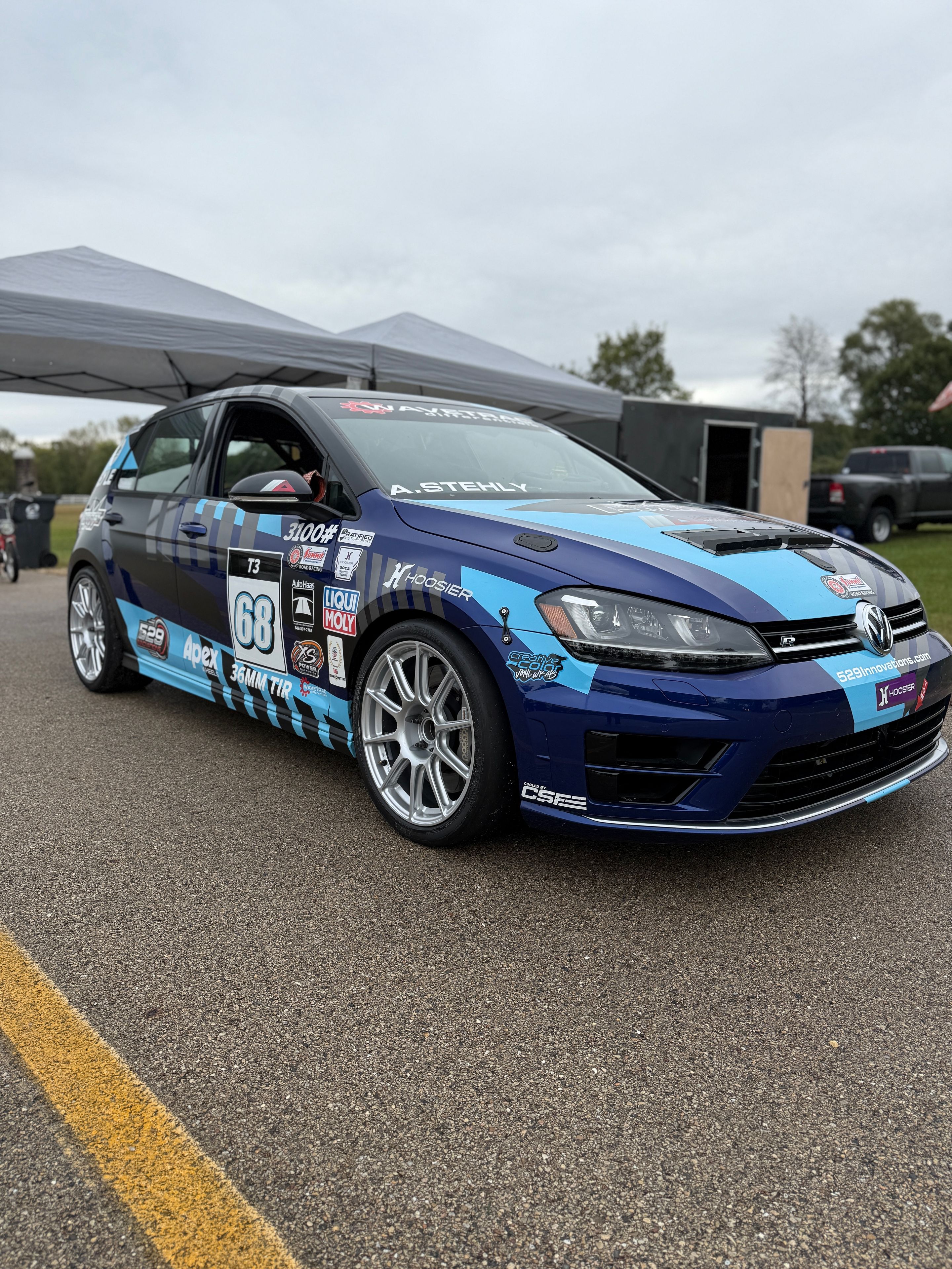 Race Livery VW MK7 Golf R with 18" SM-10 Apex wheels in Race Silver
