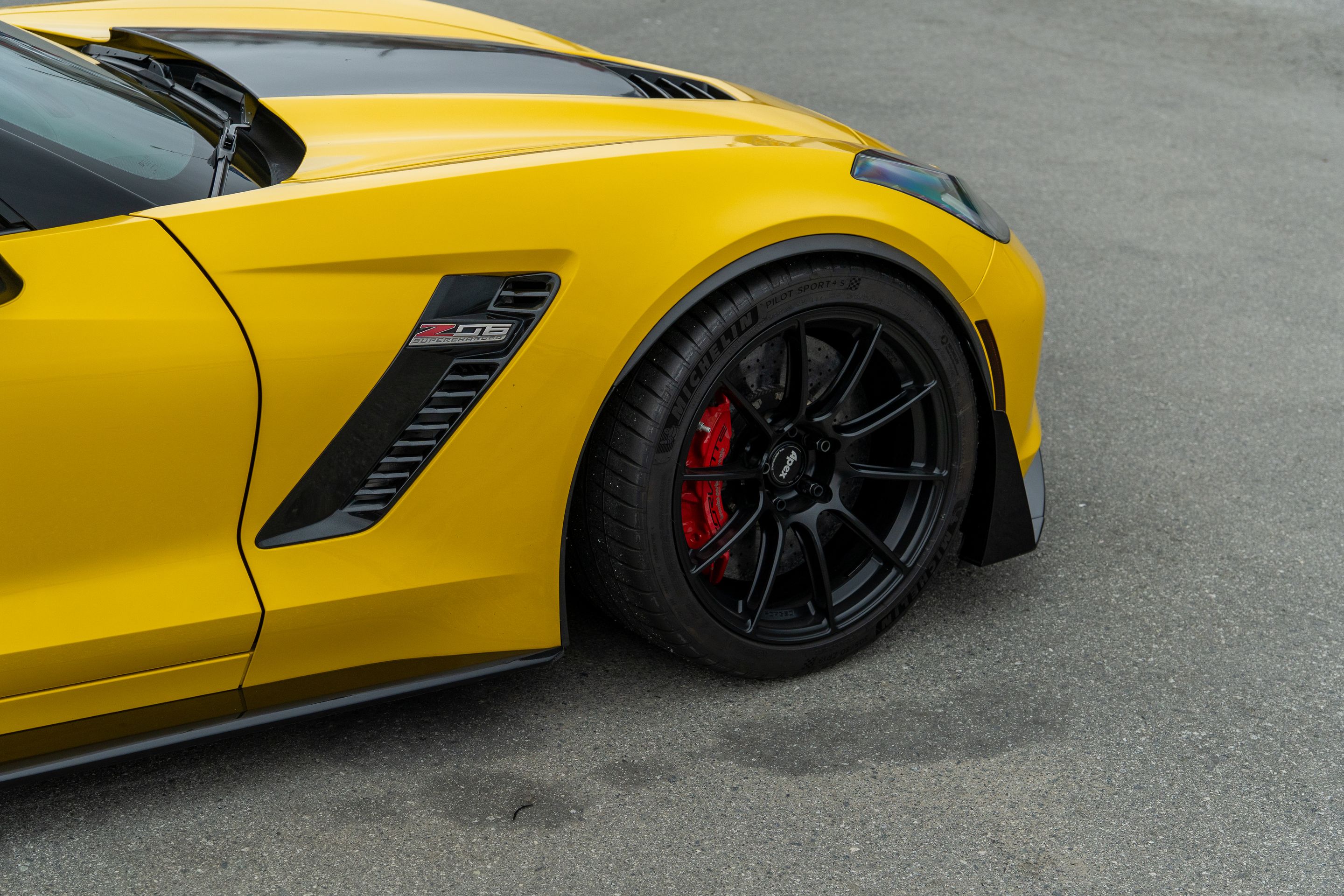 Yellow Chevrolet C7 Corvette Z06 with 19" SM-10RS Apex wheels in Satin Black