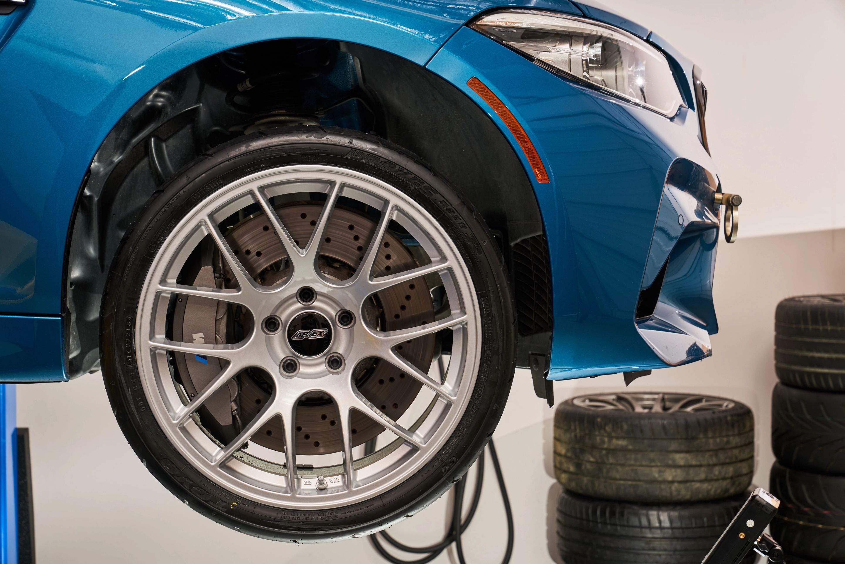 Blue BMW F87 M2 with 19" EC-7 Apex wheels in Race Silver