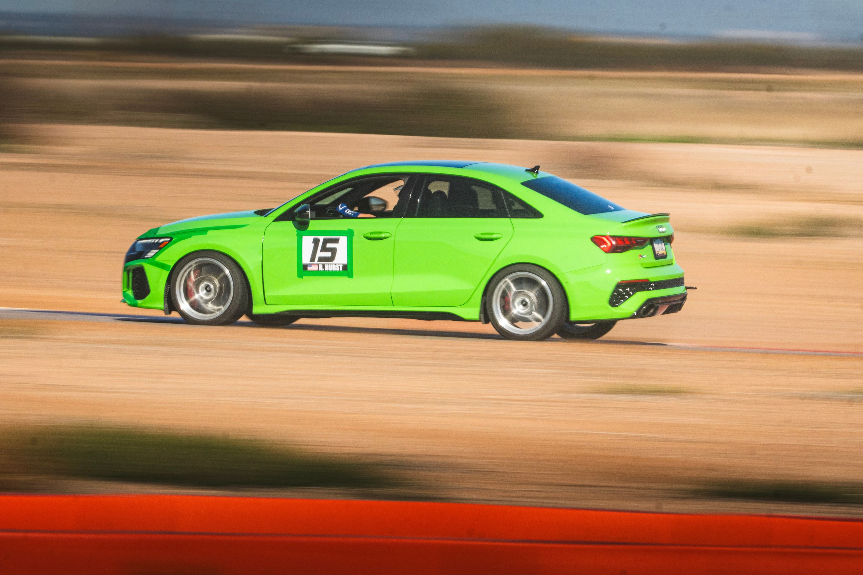 Green Audi 8Y RS 3 with 18" VS-5RS Apex wheels in Brushed Clear
