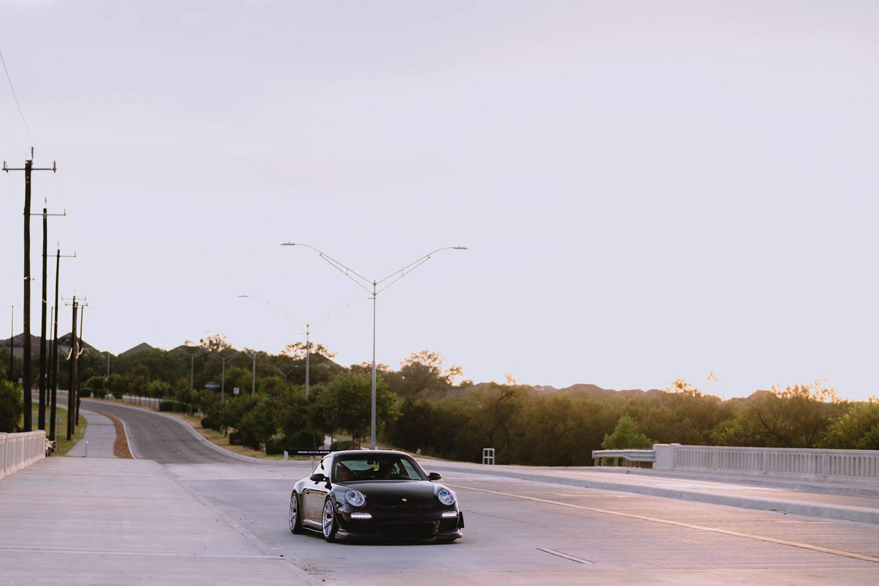 Black Porsche 911 997 Carrera S with 18" VS-5RS Apex wheels in Brushed Clear