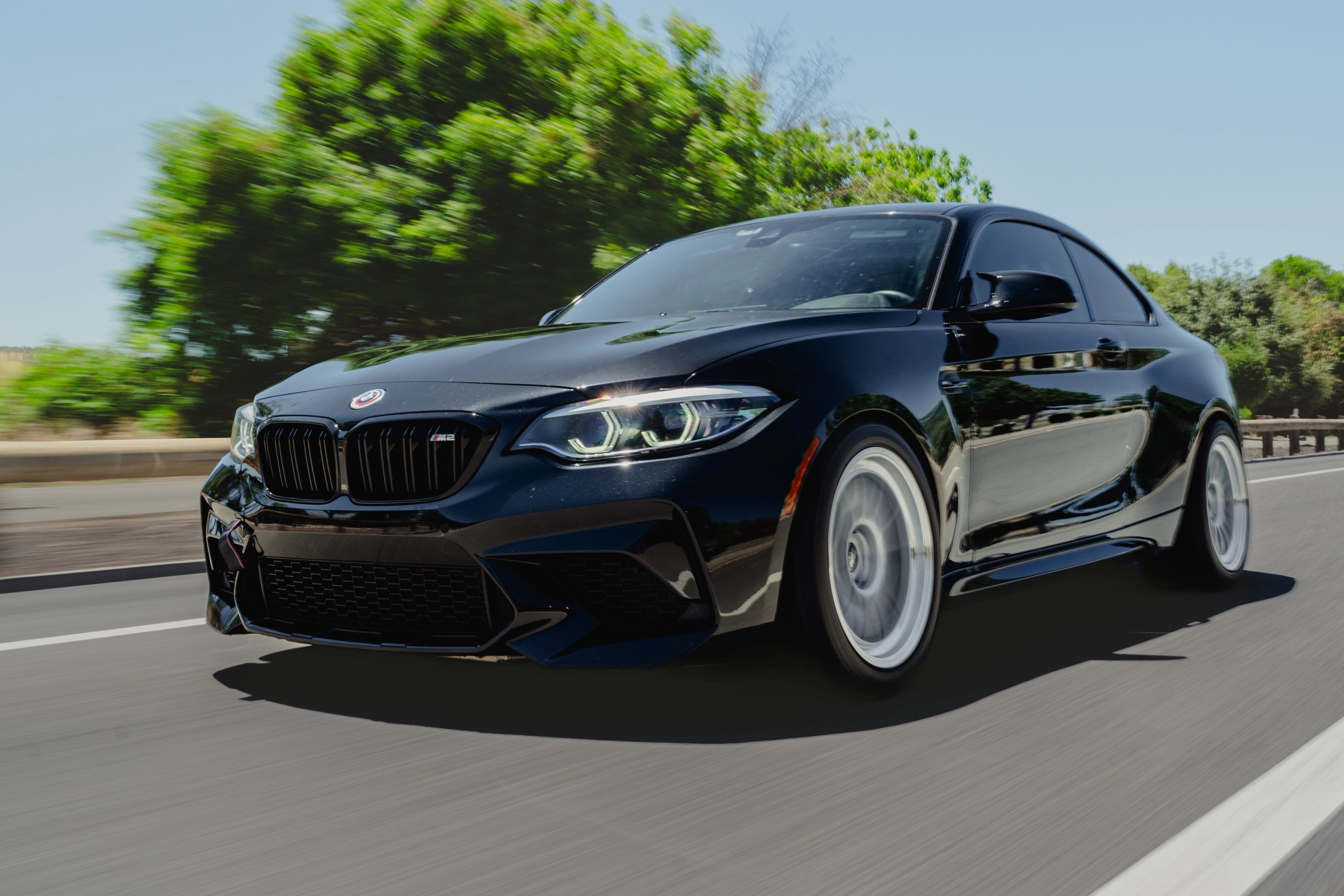 Black BMW F87 M2 with 18" ML-7RT Apex wheels in Machined Lip Race Silver