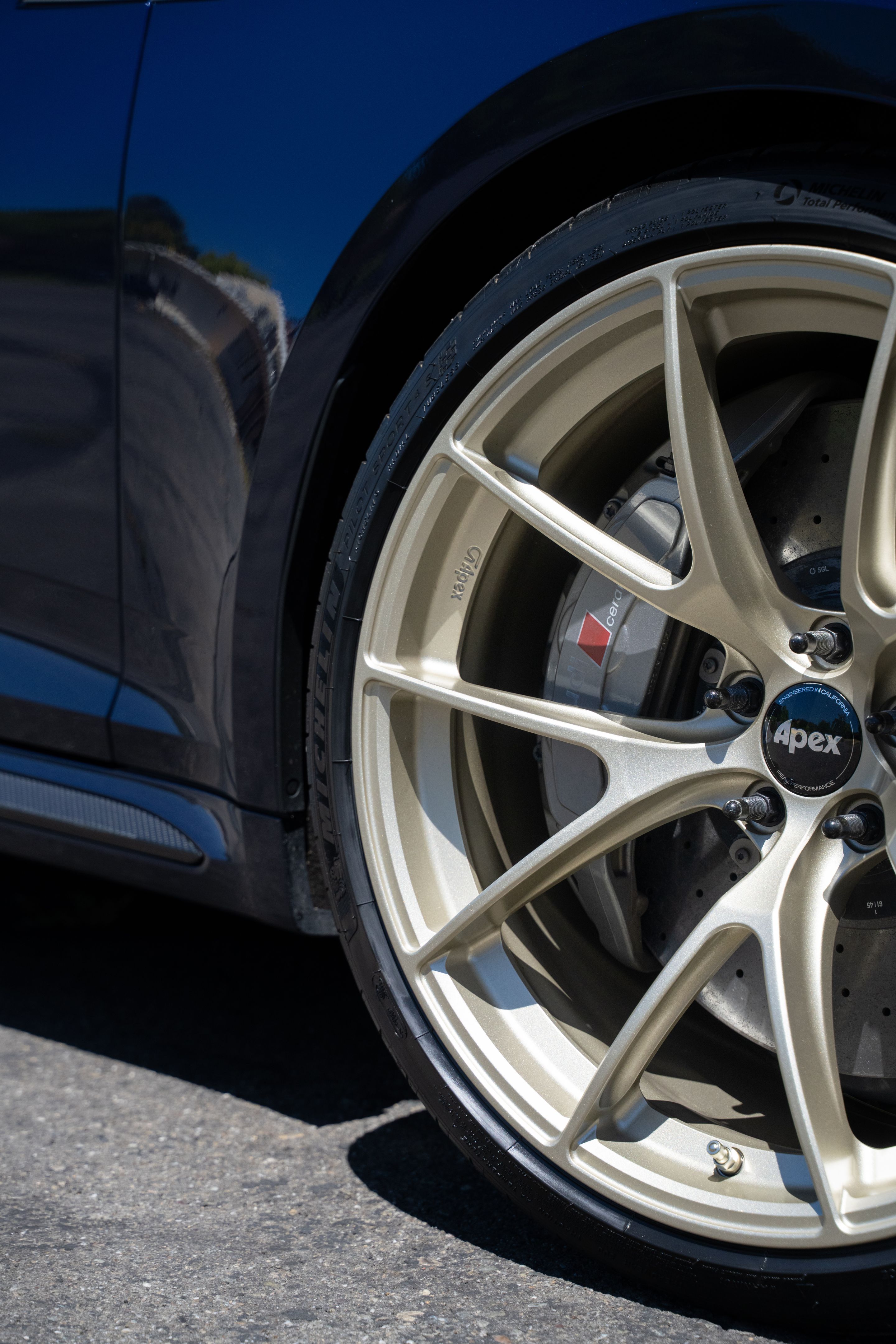 Blue Audi B9 RS 5 Sportback with 20" VS-5RS Apex wheels in Motorsport Gold