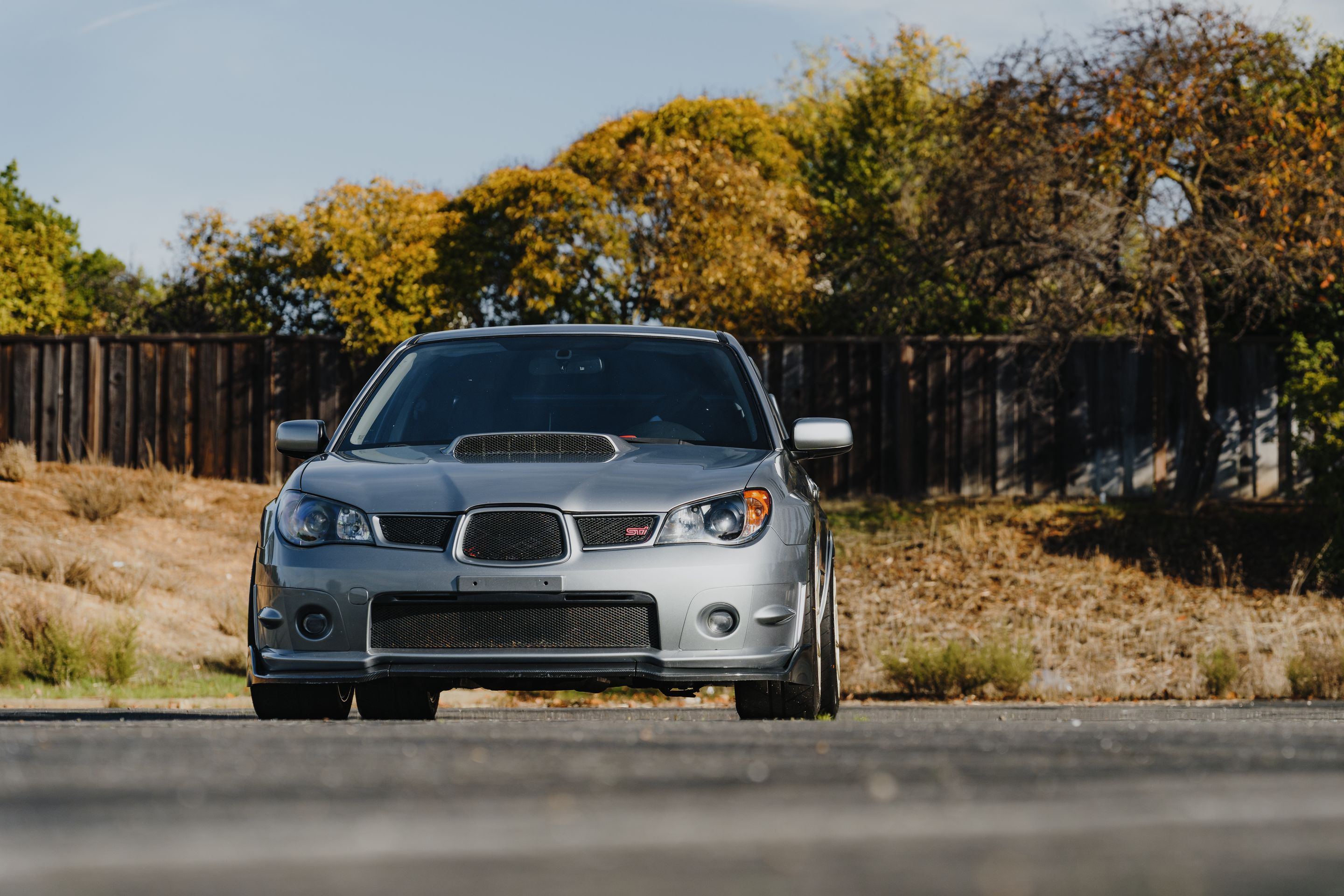 Silver Subaru GD WRX STI with 18" SM-10RS Apex wheels in Motorsport Gold