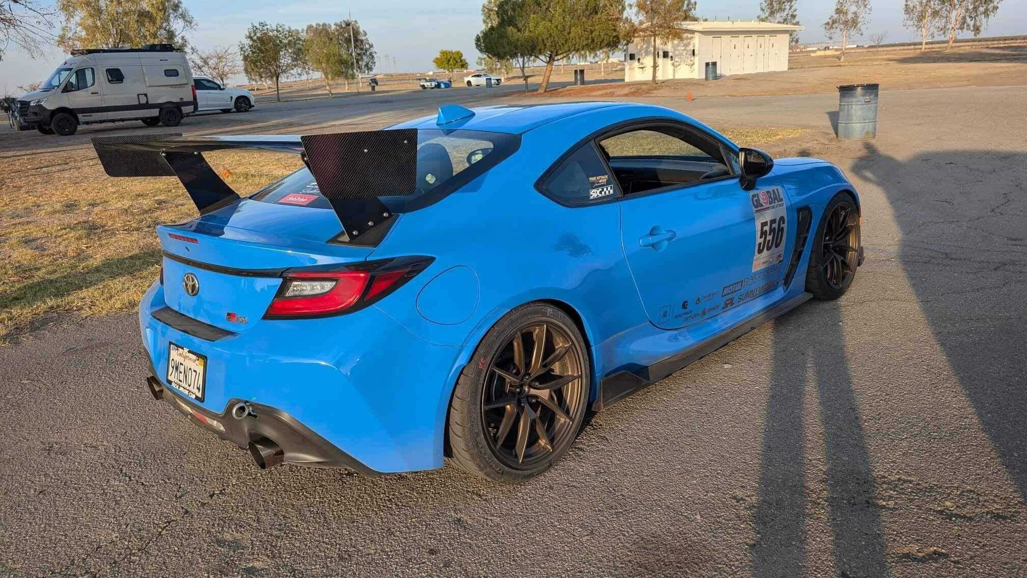 Blue Toyota GR86 with 18" VS-5RS Apex wheels in Satin Bronze