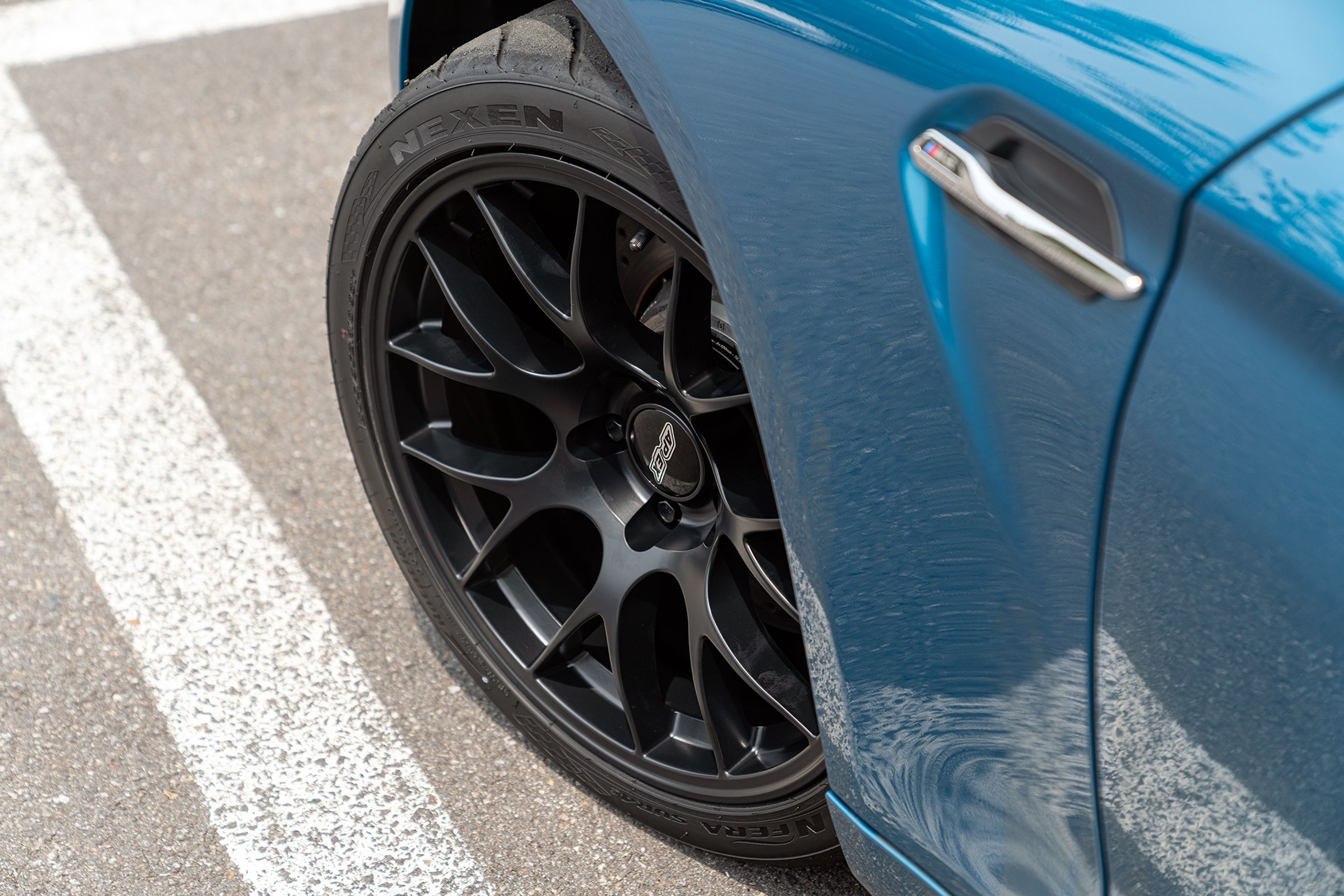 Blue BMW F87 M2 with 18" EC-7 Apex wheels in Satin Black