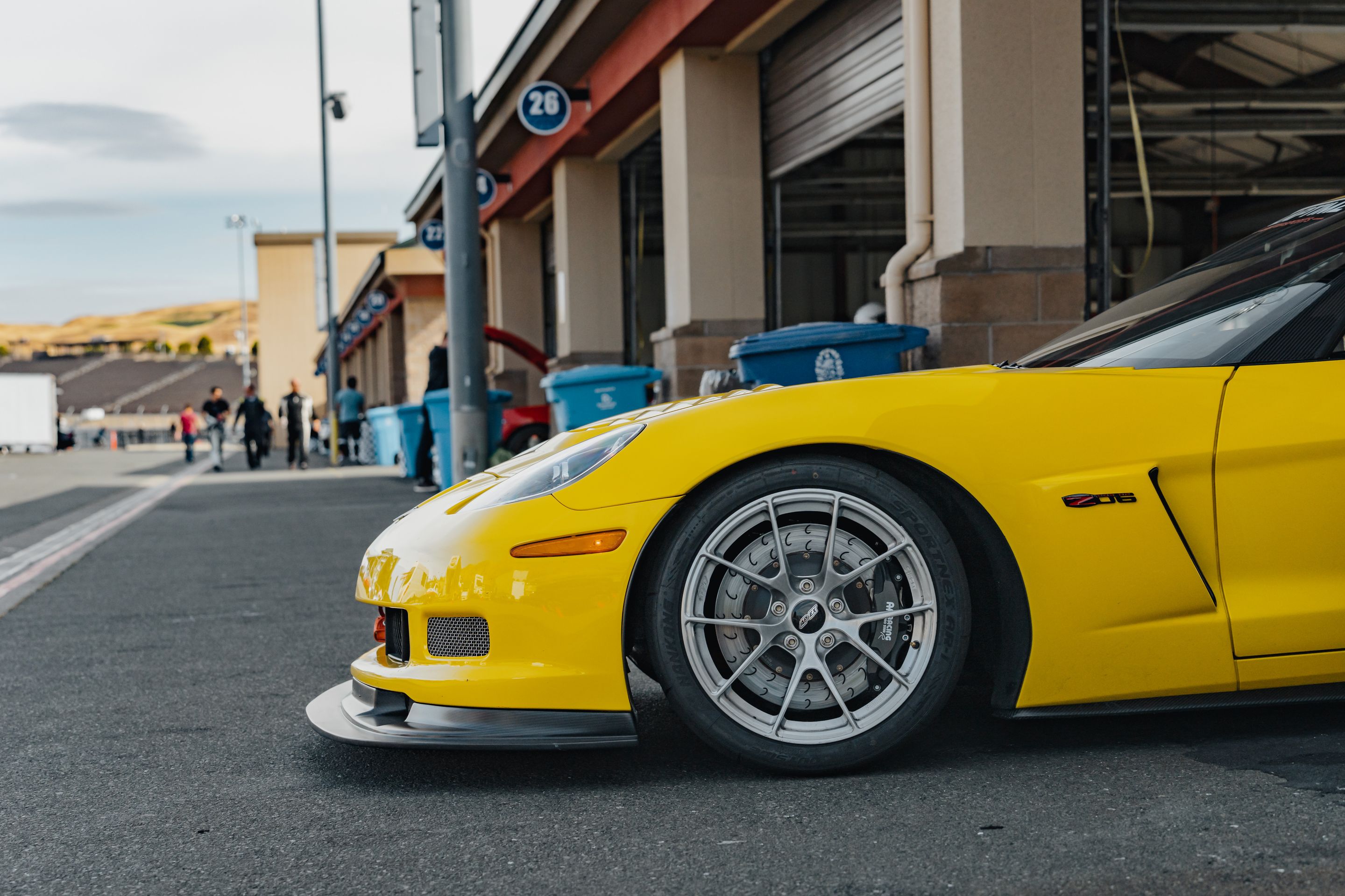 Yellow Chevrolet C6 Corvette Z06 with 18" VS-5RS Apex wheels in Brushed Clear
