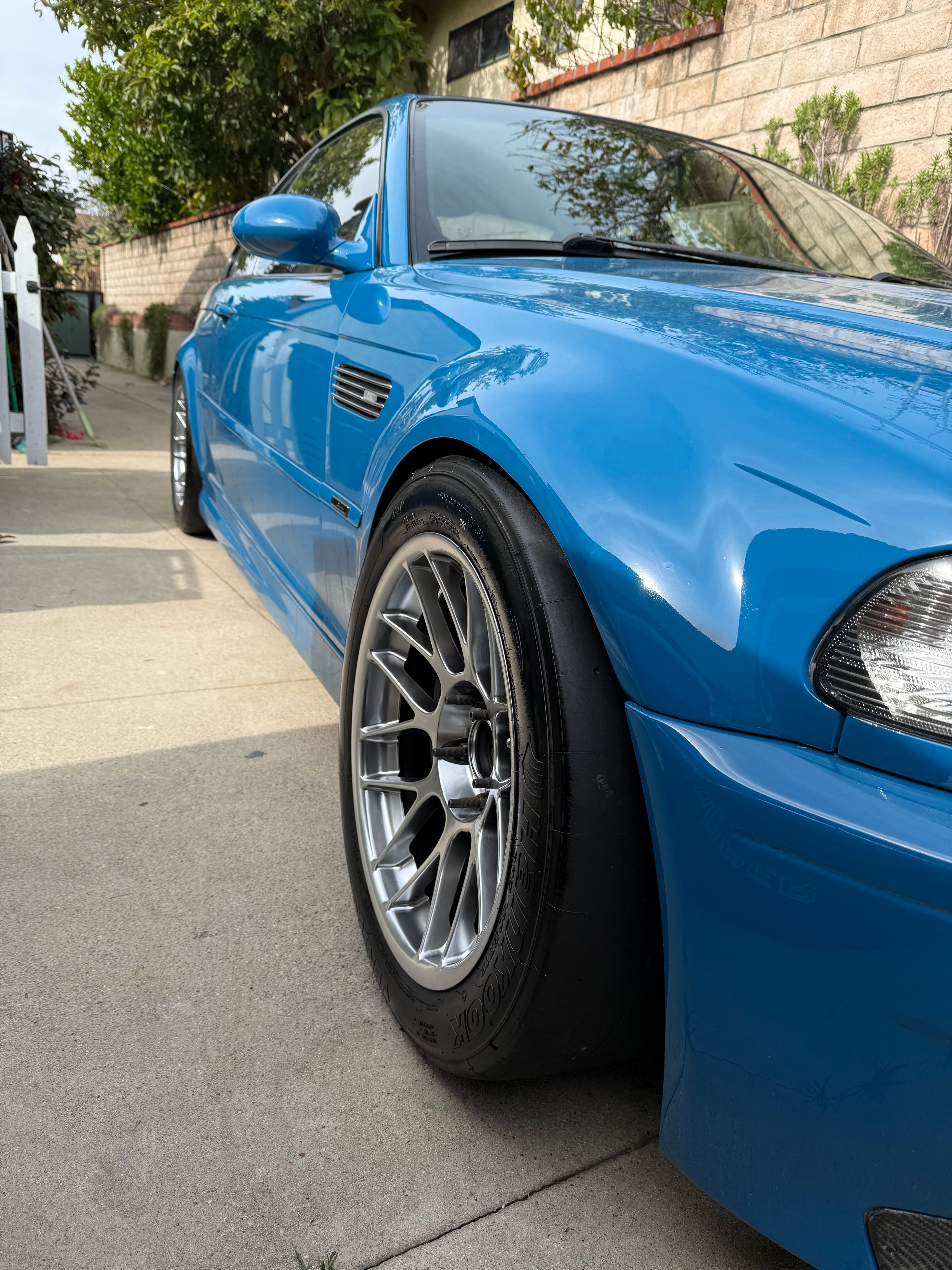 Blue BMW E46 M3 with 17" ARC-8 Apex wheels in Hyper Black