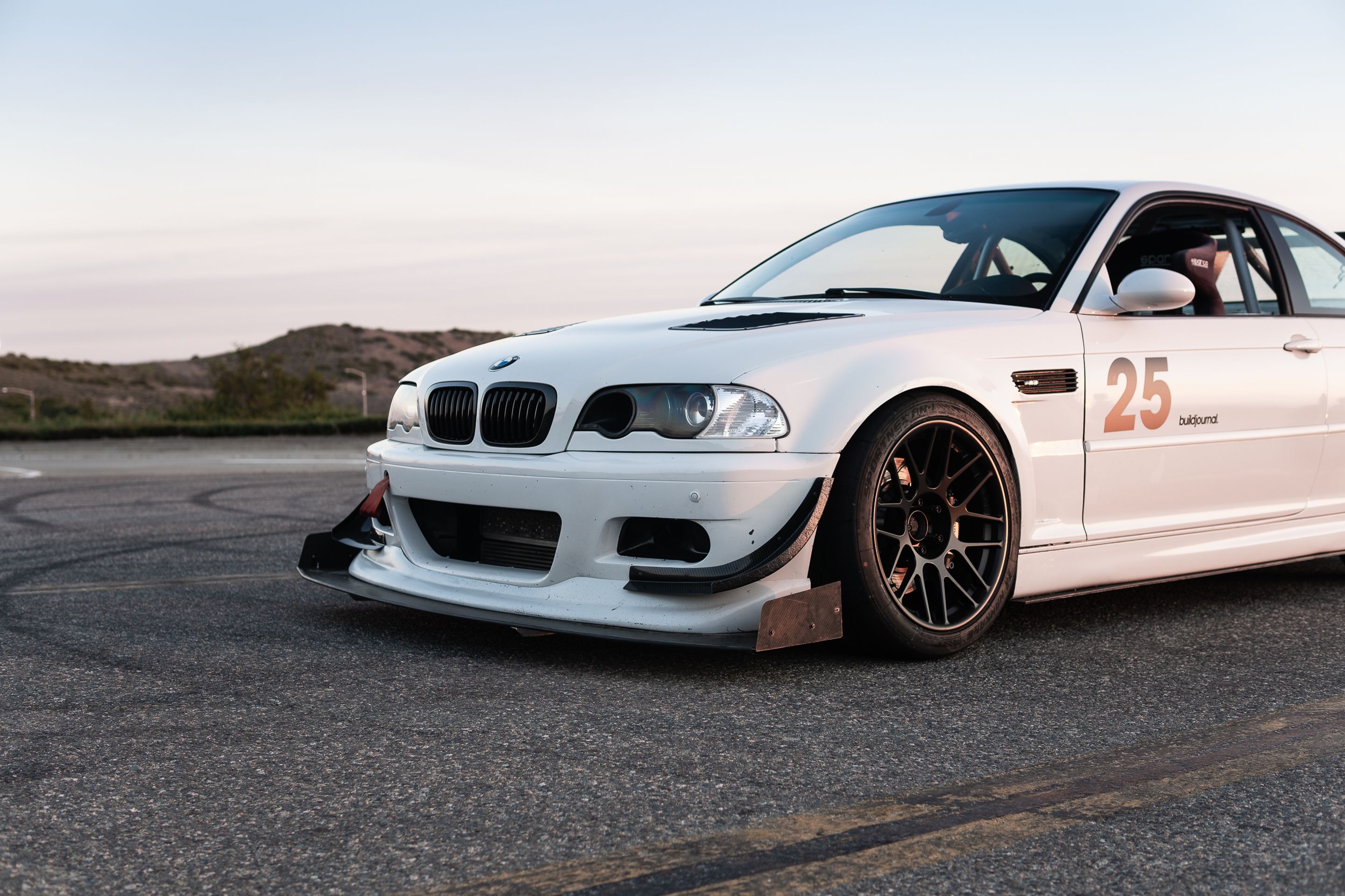 White BMW E46 M3 with 18" ARC-8R Apex wheels in Satin Black