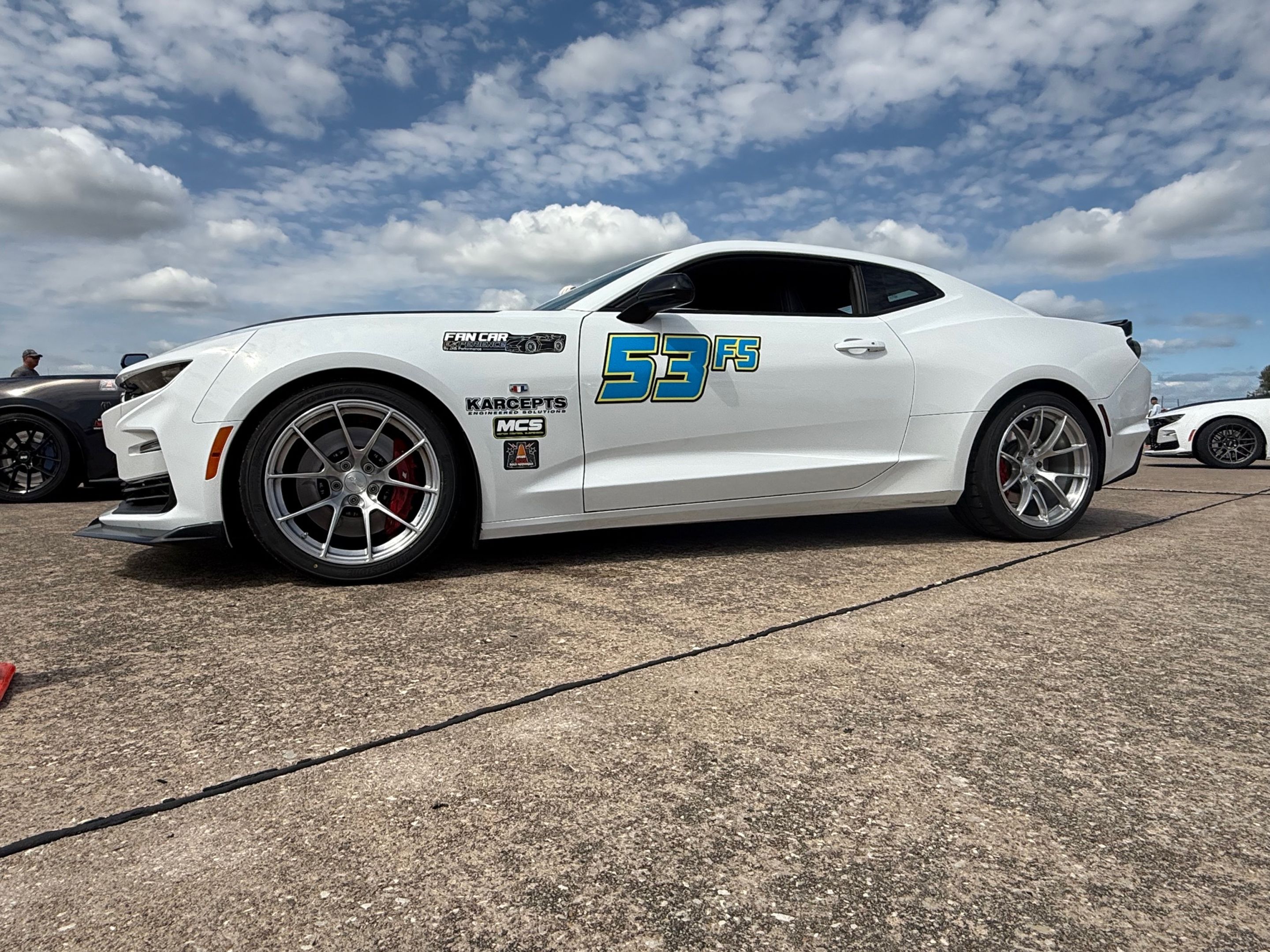White Chevrolet 6th Gen Camaro SS with 19" VS-5RS Apex wheels in Brushed Clear