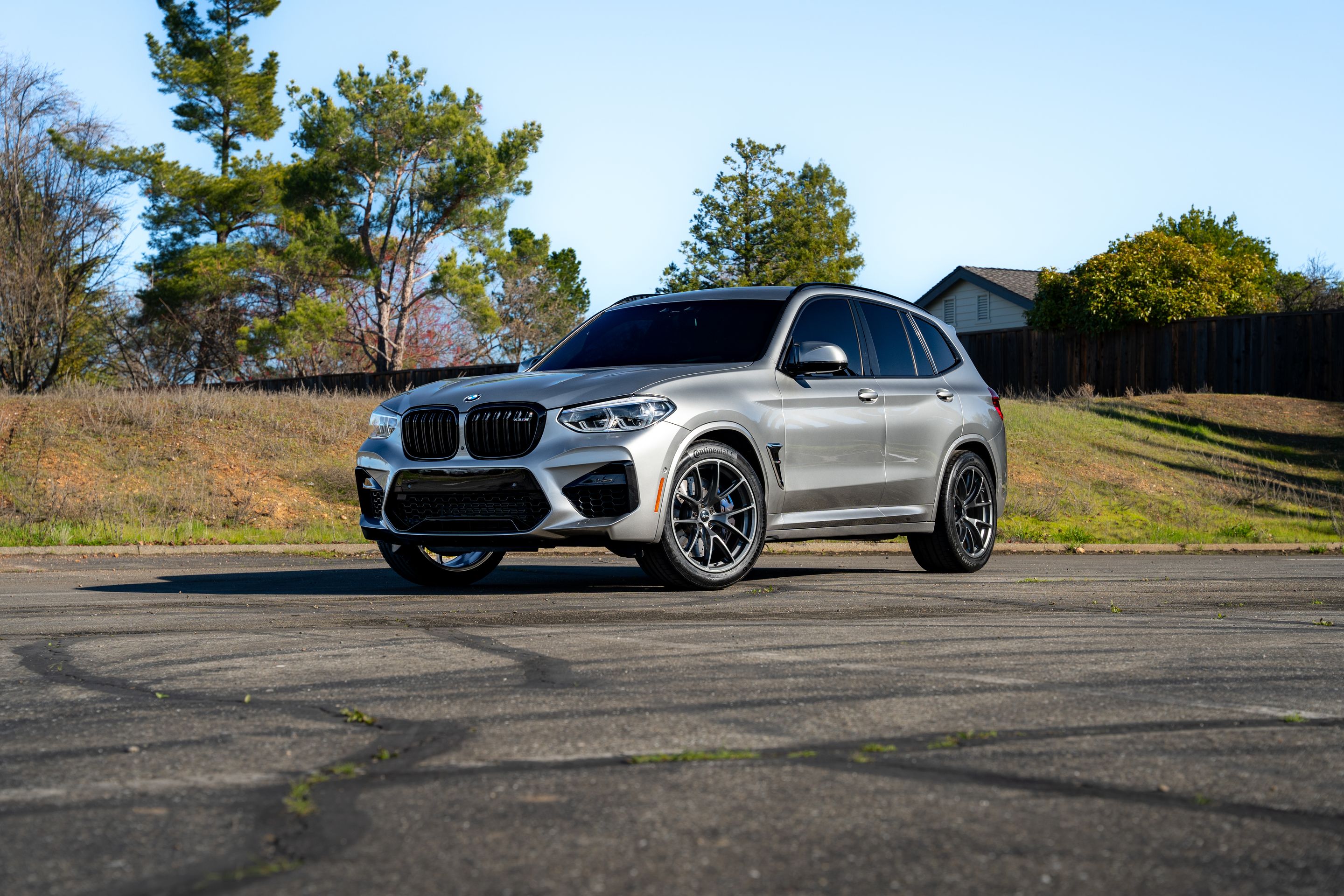 Silver BMW F97 X3M with 20" VS-5RX Apex wheels in Anthracite