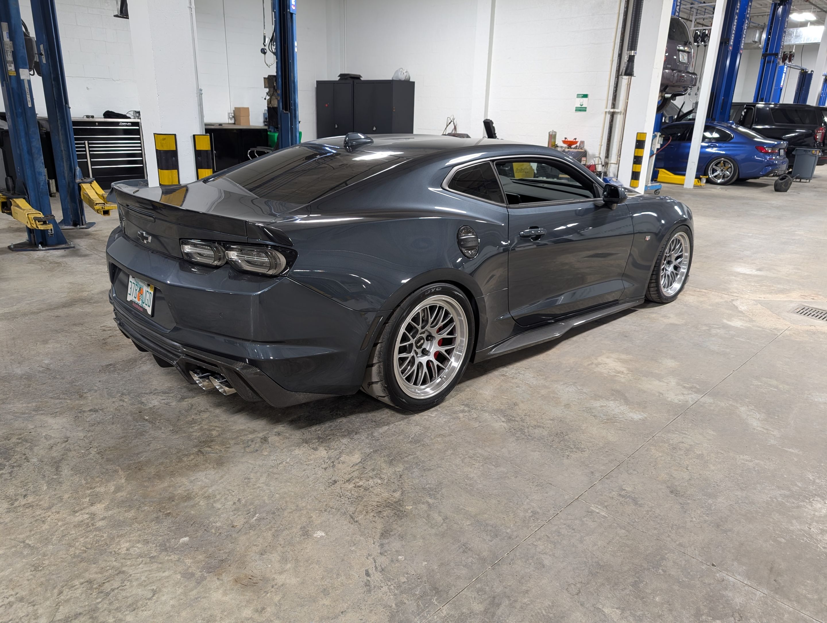 Grey Chevrolet 6th Gen Camaro SS with 19" ML-10RT Apex wheels in Machined Lip Race Silver