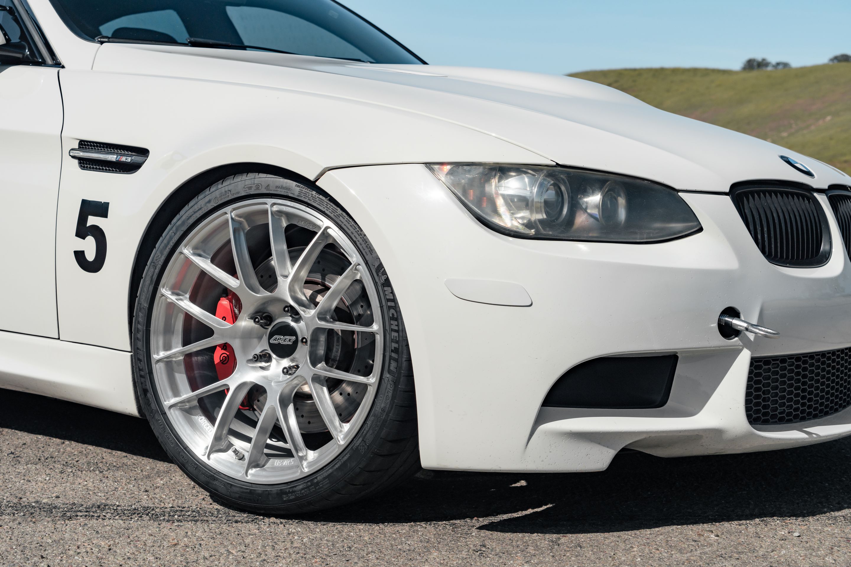 White BMW E90 Sedan M3 with 19" EC-7RS Apex wheels in Brushed Clear