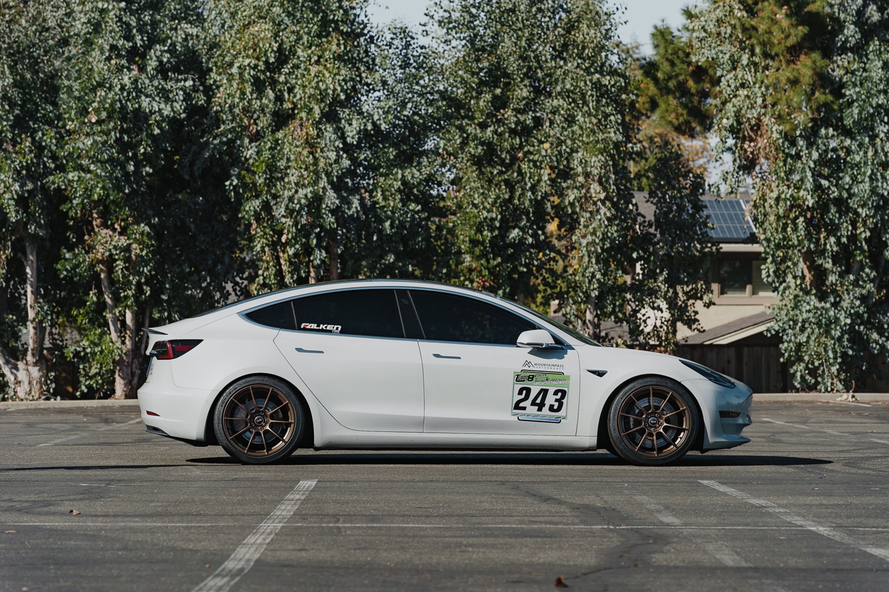 White Tesla Model 3 with 19" SM-10RS Apex wheels in Satin Bronze