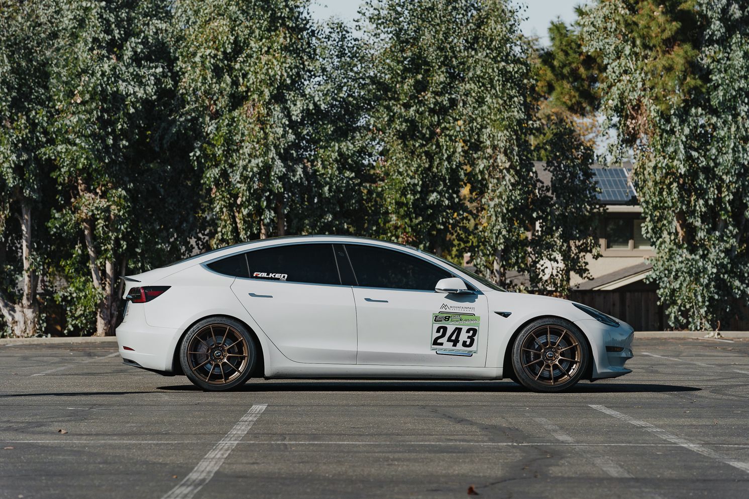 White Tesla Model 3 with 19" SM-10RS Apex wheels in Satin Bronze