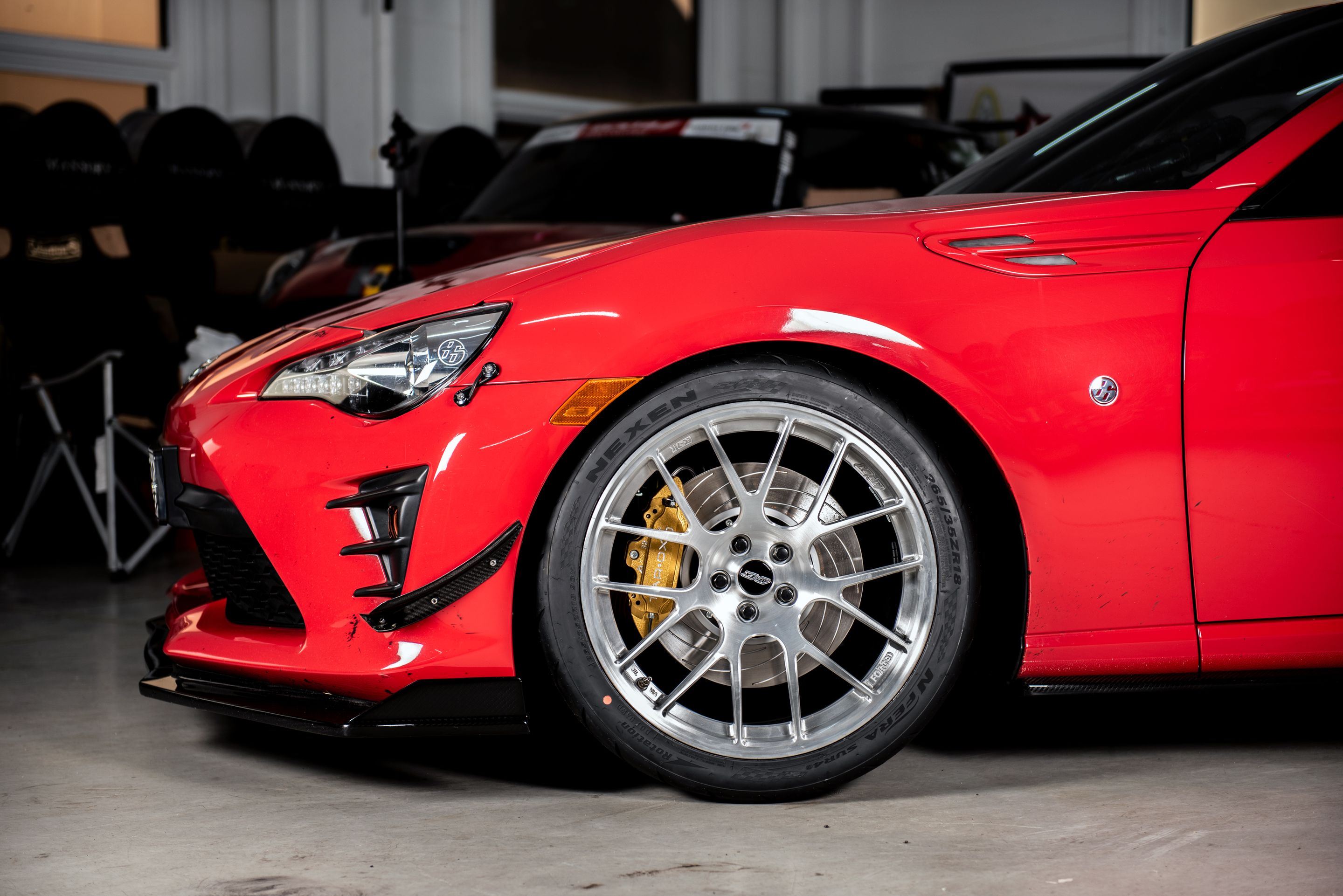 Red Toyota 86 / GT86 / FT86 with 18" EC-7R Apex wheels in Brushed Clear
