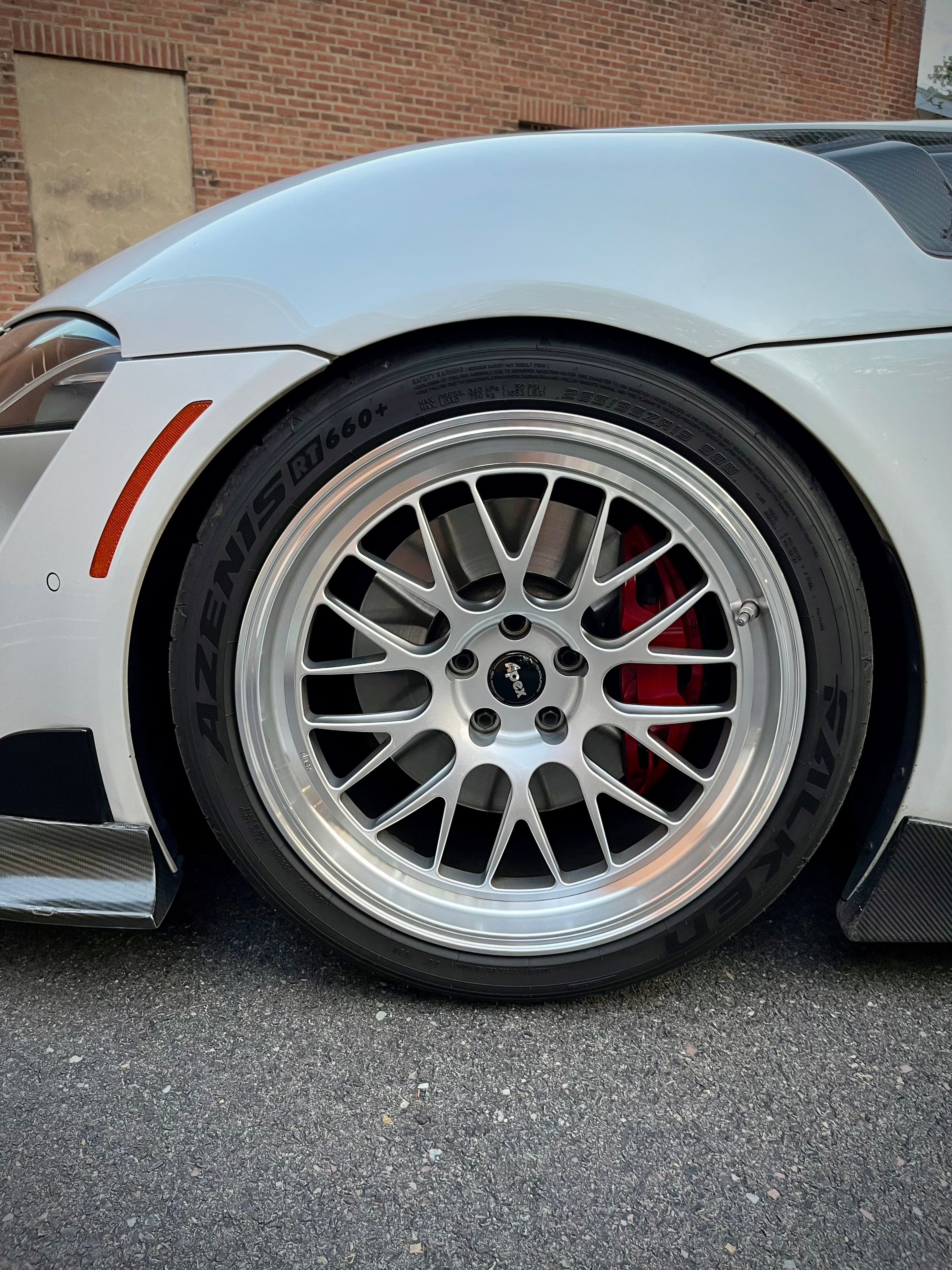 White Toyota GR Supra with 19" ML-10RT Apex wheels in Machined Lip Race Silver