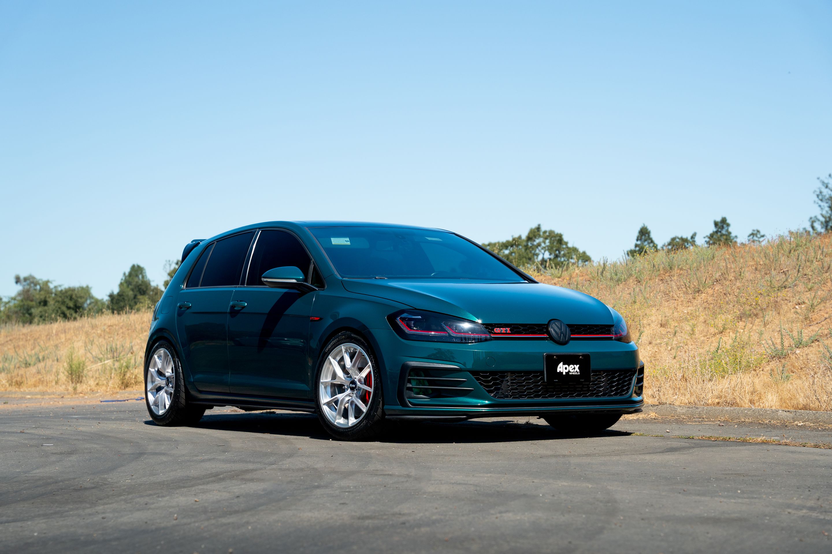 Green VW MK7 GTI with 17" VS-5RS Apex wheels in Brushed Clear