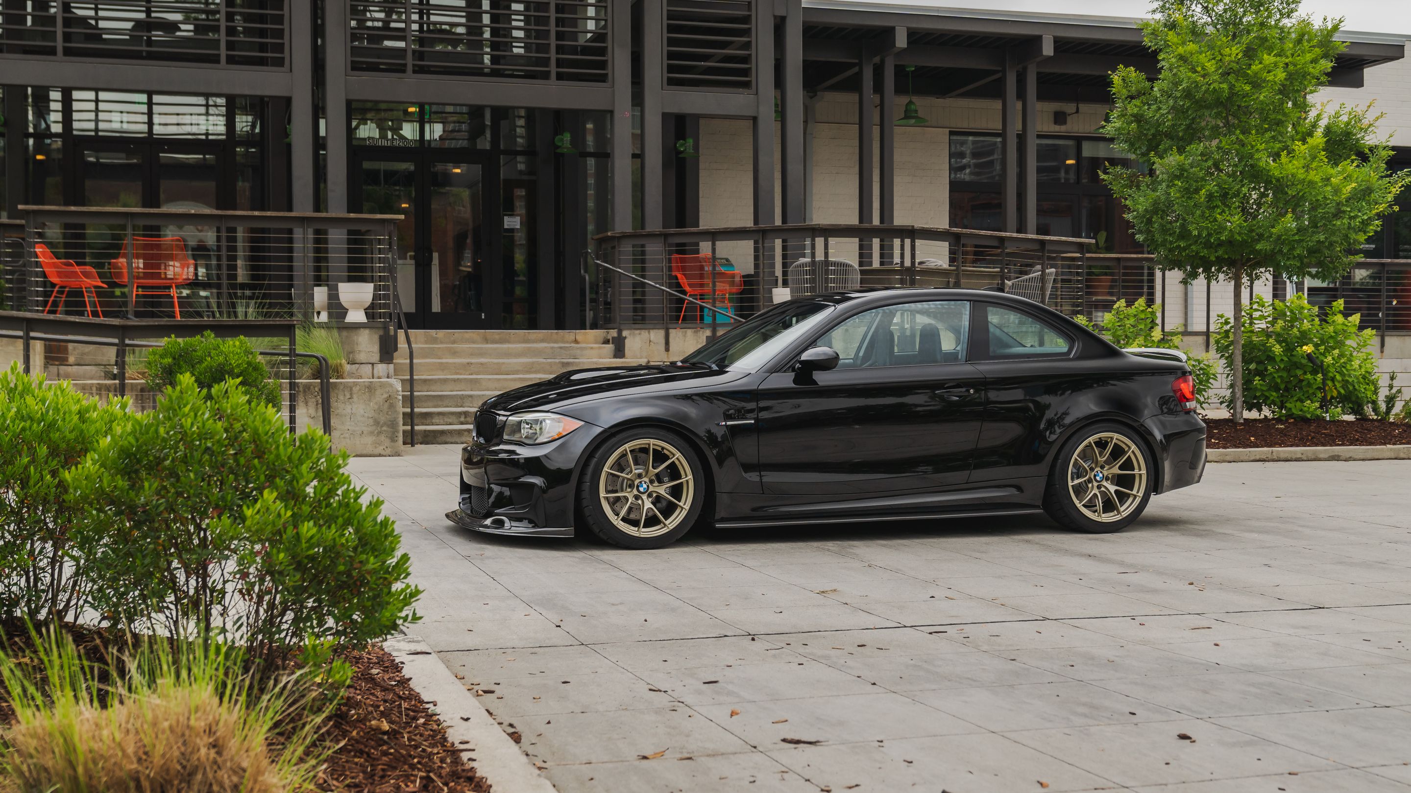 Black BMW E82 Coupe 1 Series with 18" VS-5RS Apex wheels in Motorsport Gold