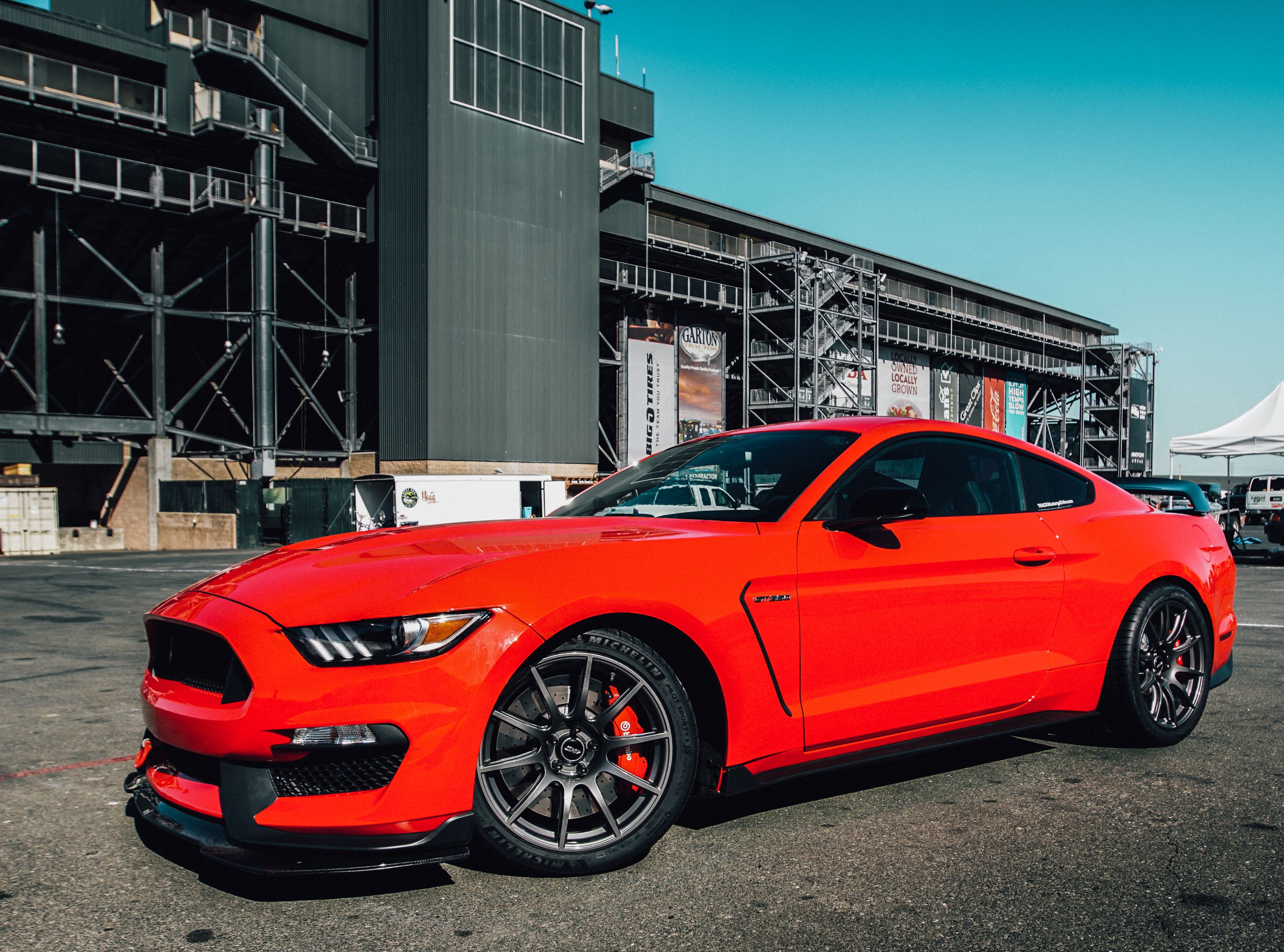 Red Ford S550 Mustang GT350 with 19" SM-10 Apex wheels in Anthracite