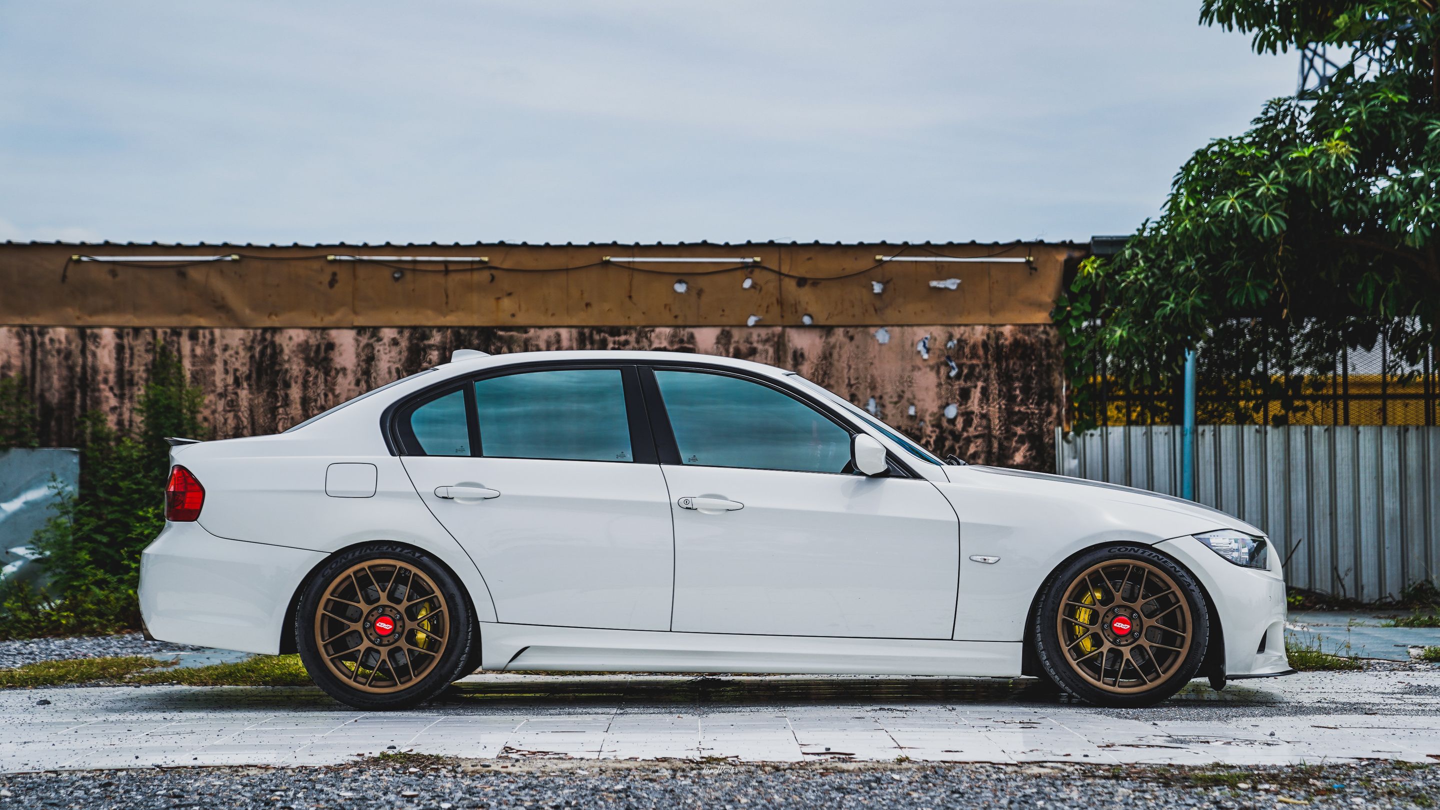 White BMW E90 LCI Sedan 3 Series with 18" ARC-8 Apex wheels in Satin Bronze