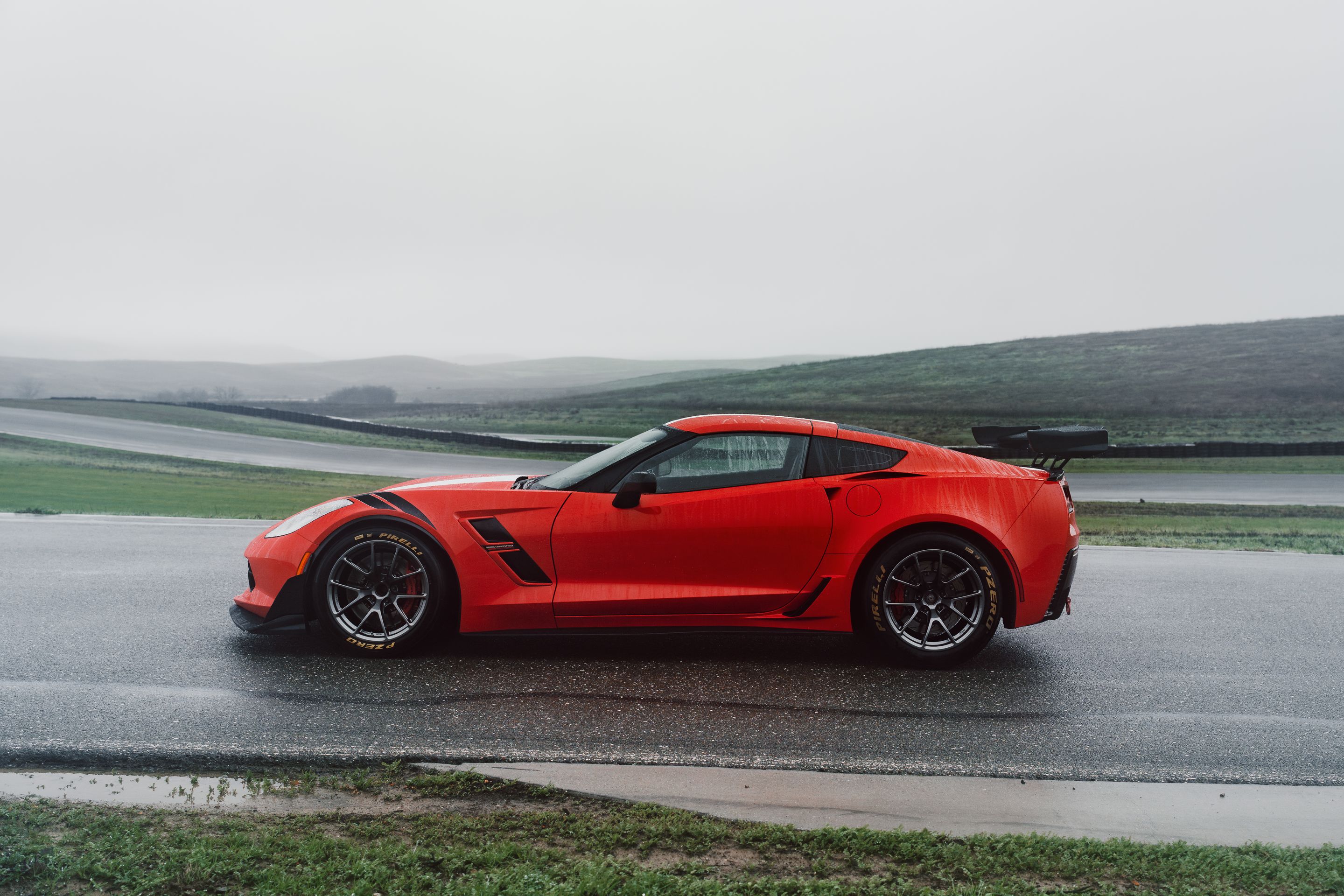 Red Chevrolet C7 Corvette Grand Sport with 18" VS-5RE Apex wheels in Anthracite