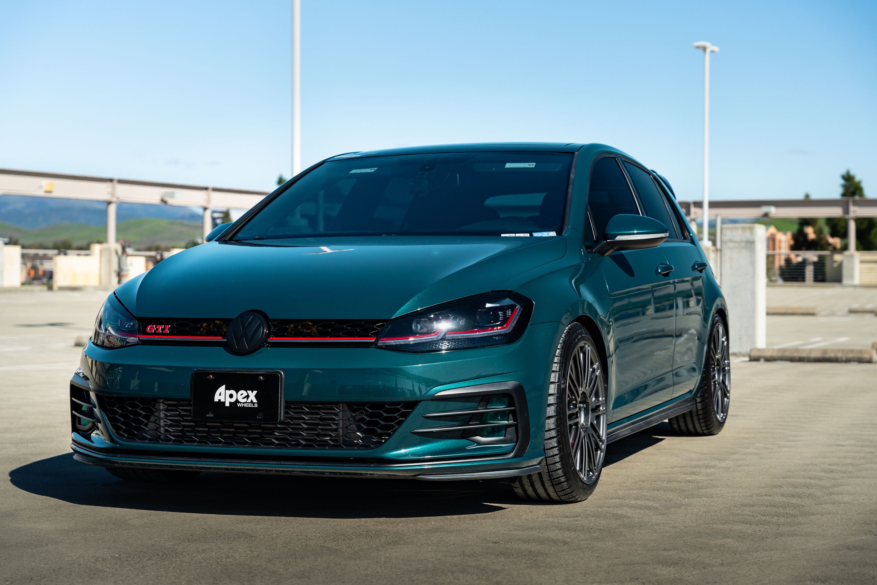 Green VW MK7 GTI with 18" TC-10RT Apex wheels in Anthracite