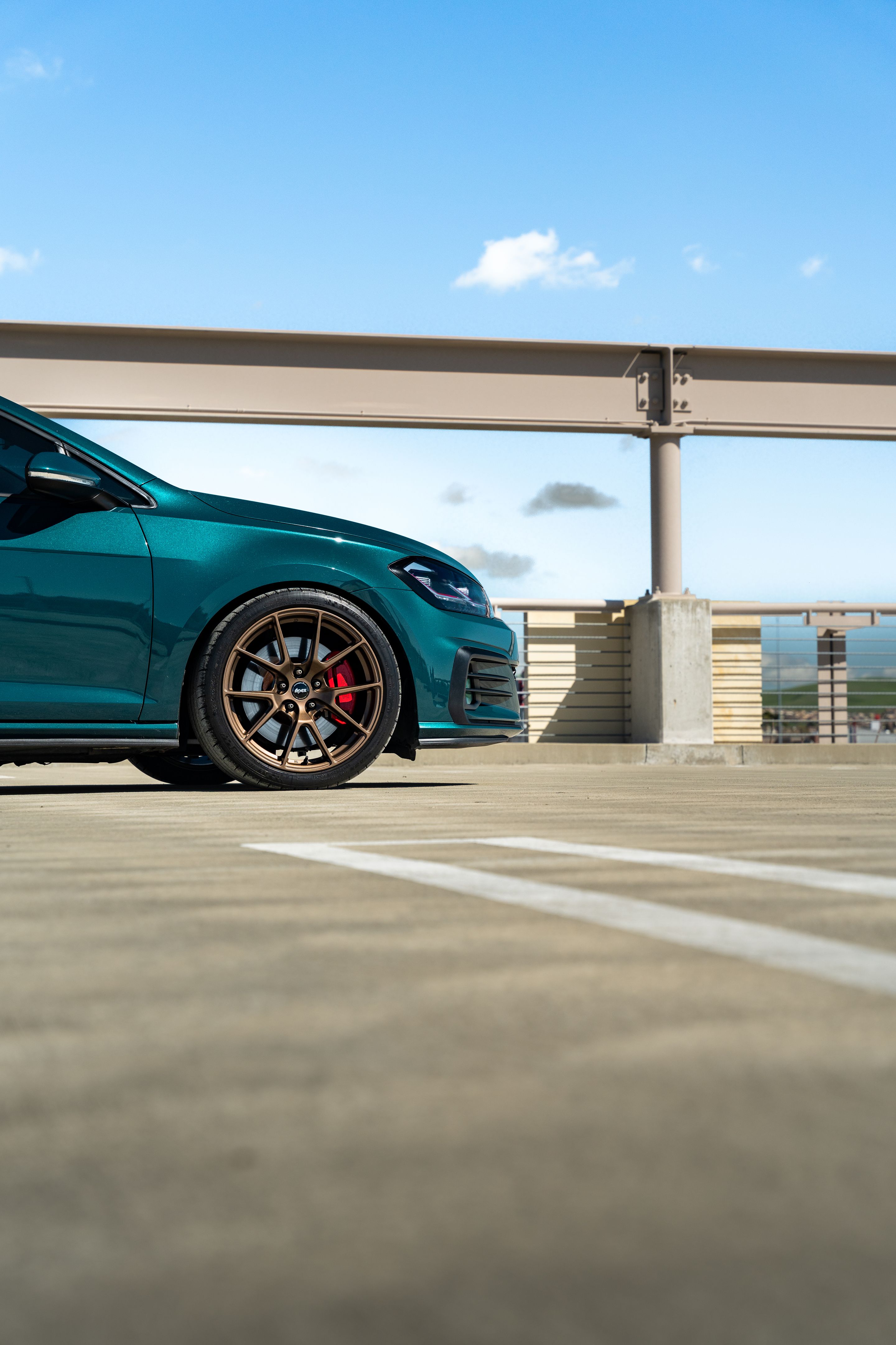 Green VW MK7 GTI with 18" VS-5 Apex wheels in Satin Bronze
