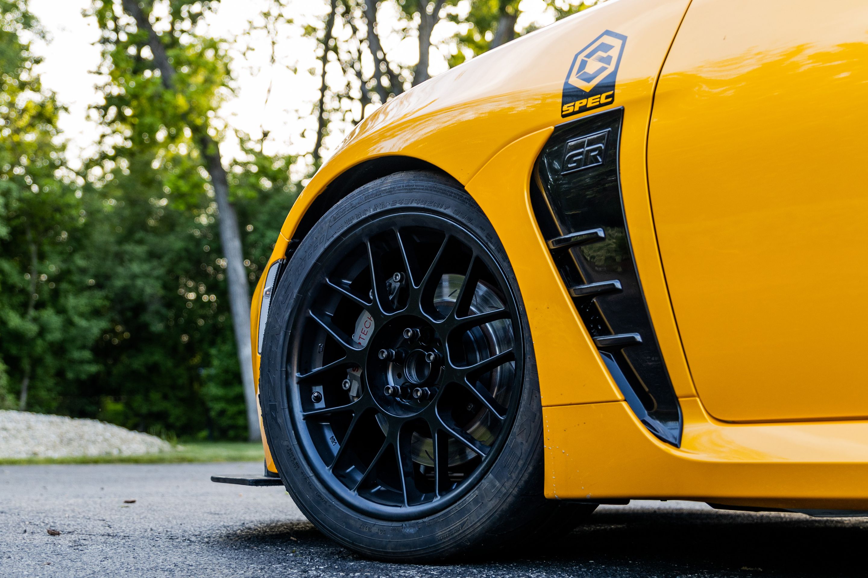 Yellow Toyota GR86 with 17" ARC-8 Apex wheels in Satin Black