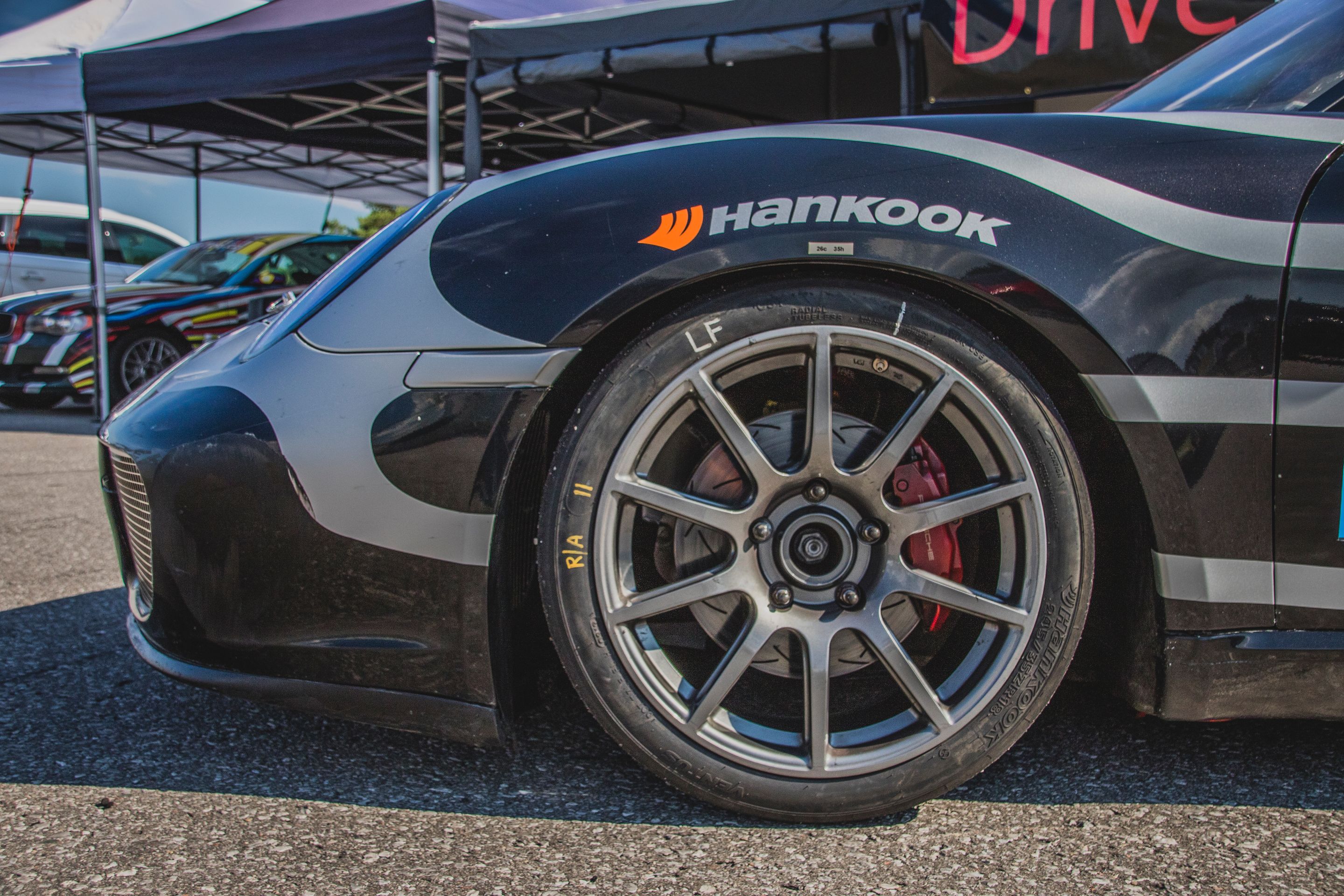 Black Porsche 987 Spec Cayman (SPC) with 18" SM-10 Apex wheels in Anthracite