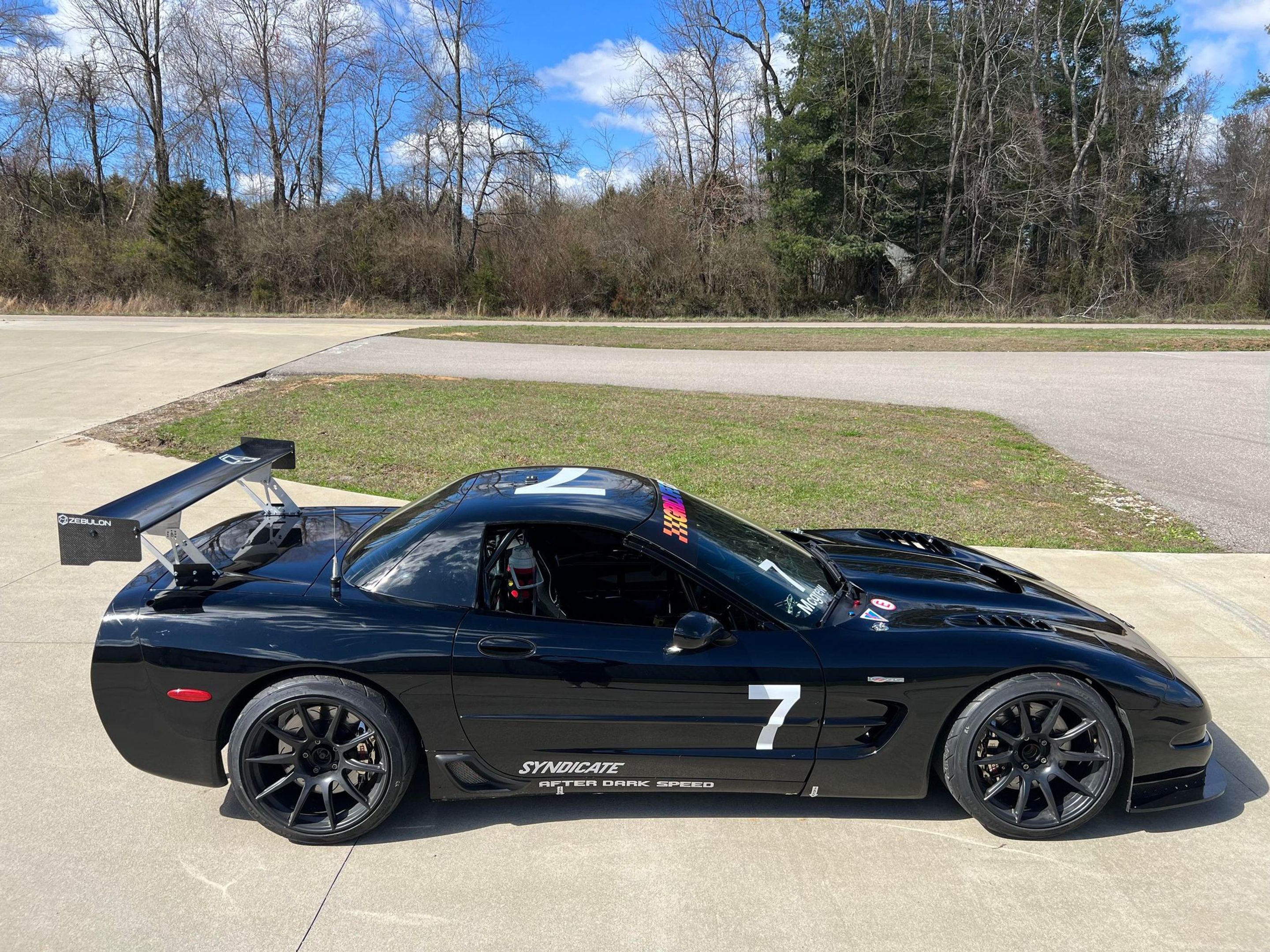 Black Chevrolet C5 Corvette Z06 with 19" SM-10 Apex wheels in Satin Black
