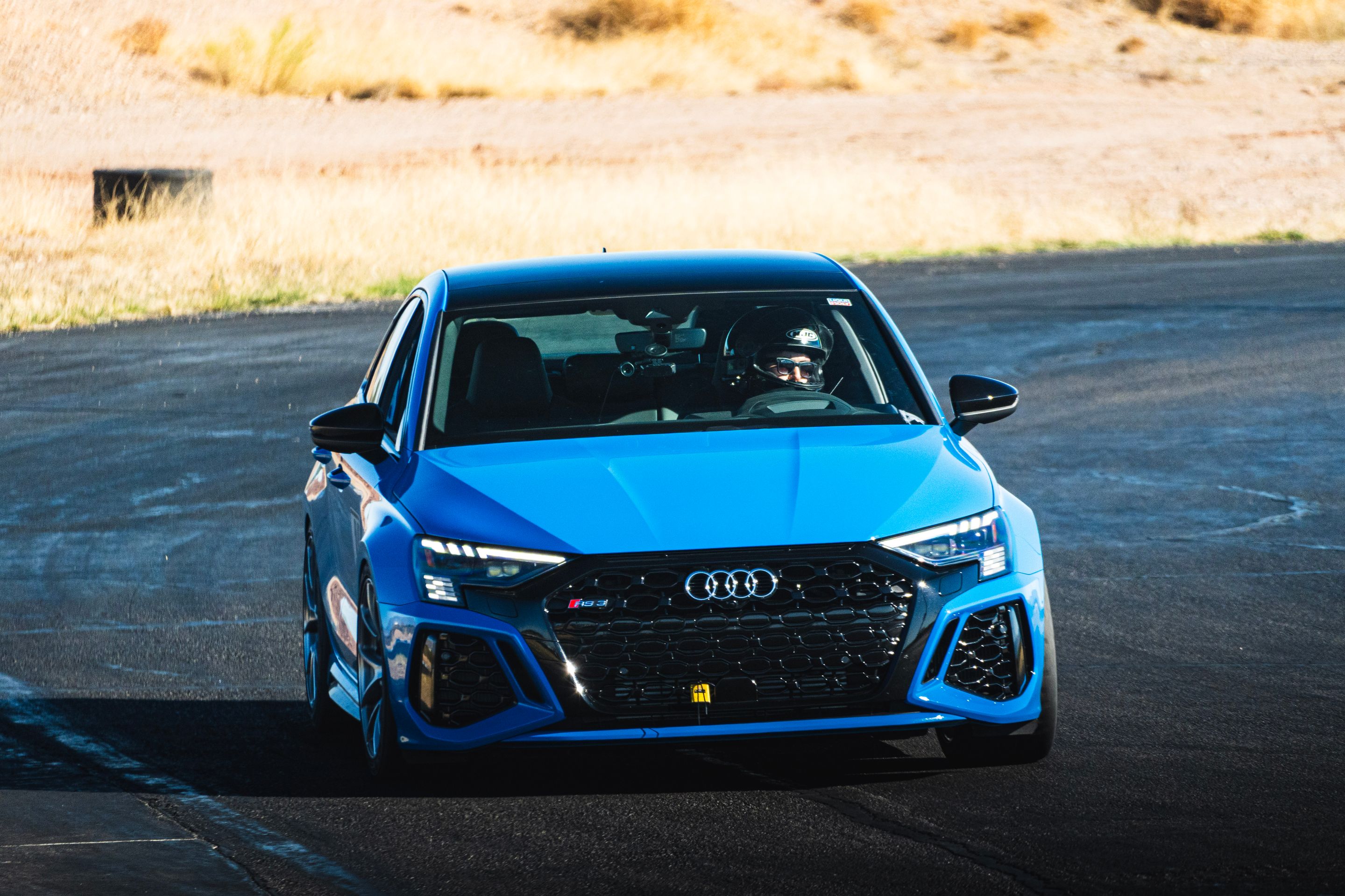 Blue Audi 8Y RS 3 with 18" VS-5RS Apex wheels in Brushed Clear
