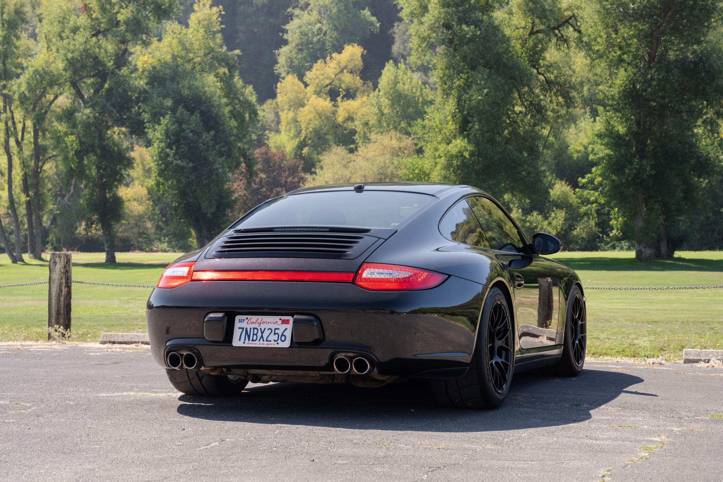 Black Porsche 911 997 Carrera 4S with 18" EC-7RS Apex wheels in Satin Black