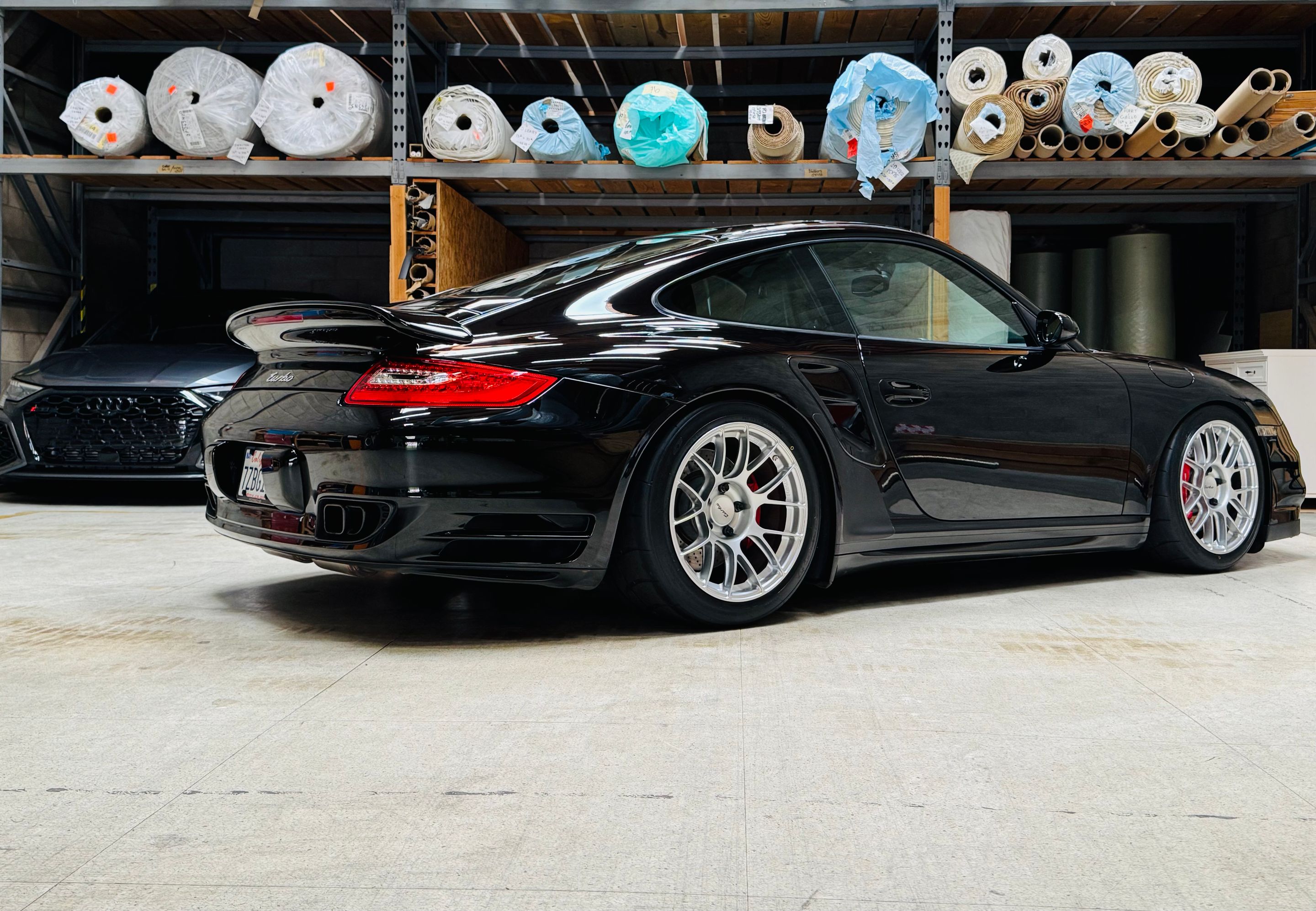 Black Porsche 911 997 Turbo with 18" EC-7RS Apex wheels in Race Silver