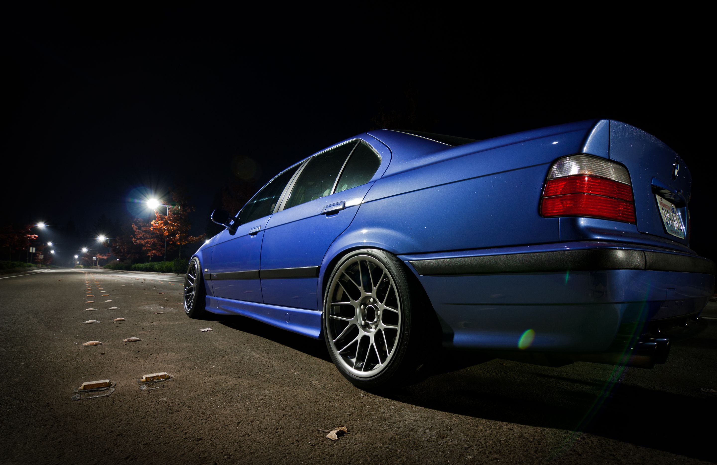Blue BMW E36 M3 with 18" ARC-8 Apex wheels in Hyper Black
