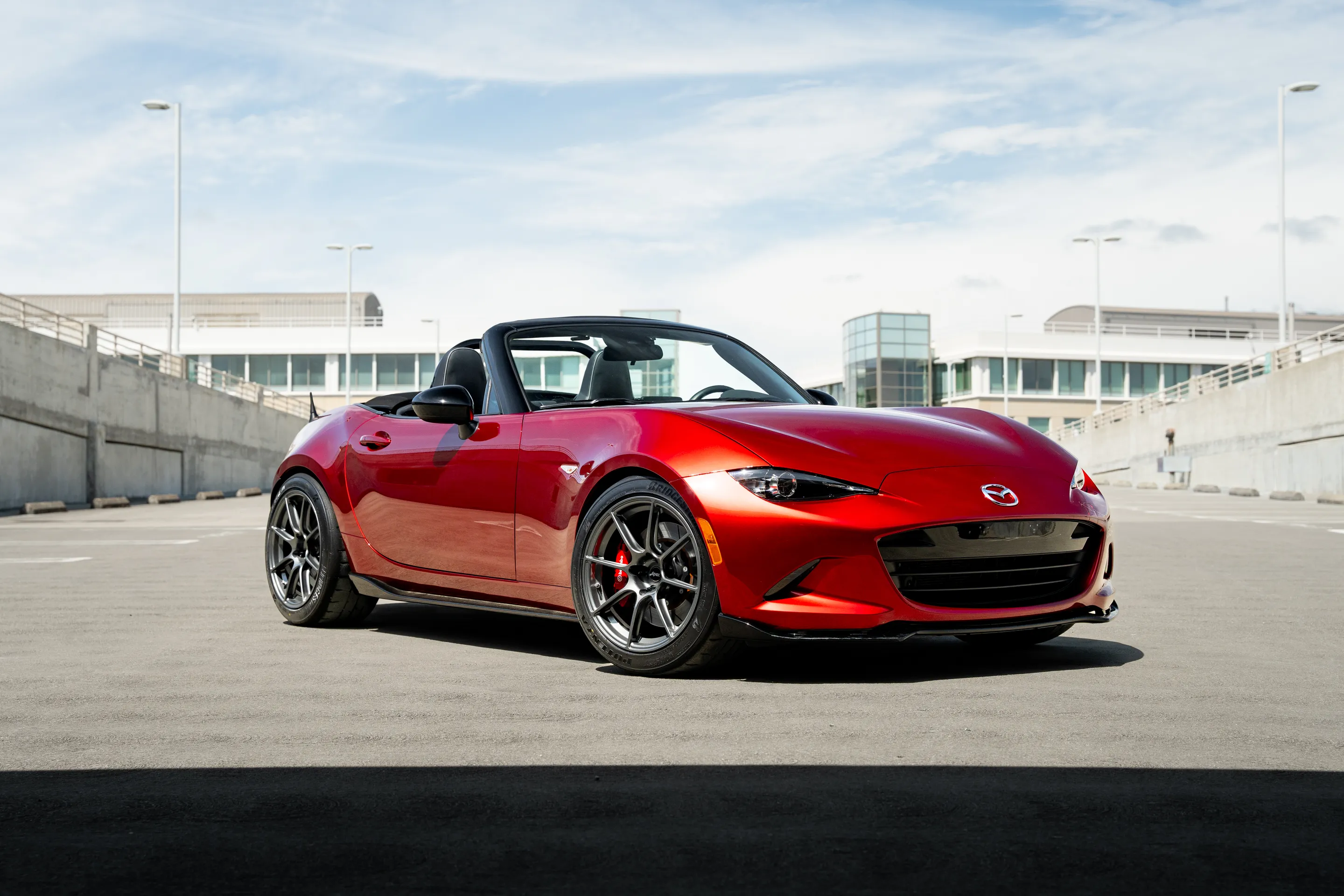 Red Mazda ND MX-5 Miata with 17" SM-8RS Apex wheels in Anthracite