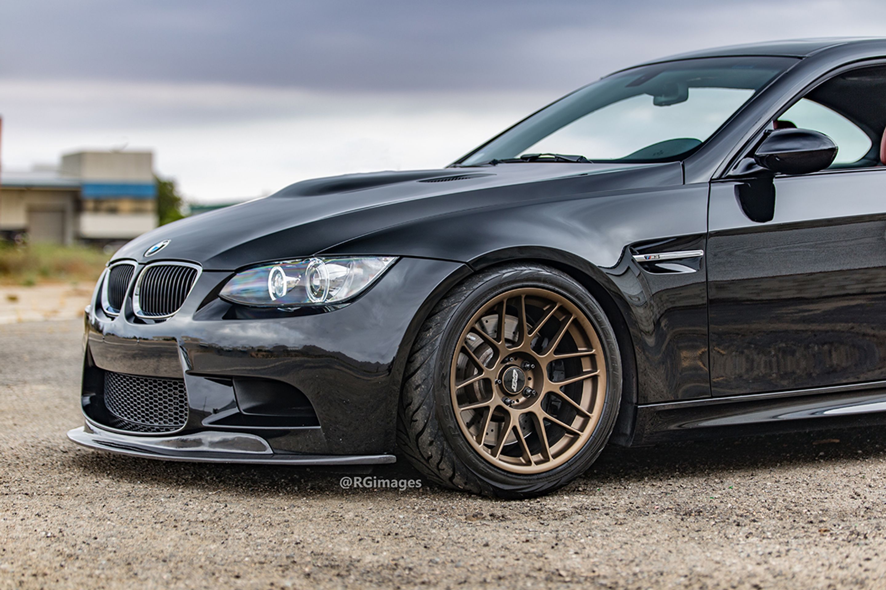 Black BMW E92 Coupe M3 with 18" ARC-8 Apex wheels in Satin Bronze