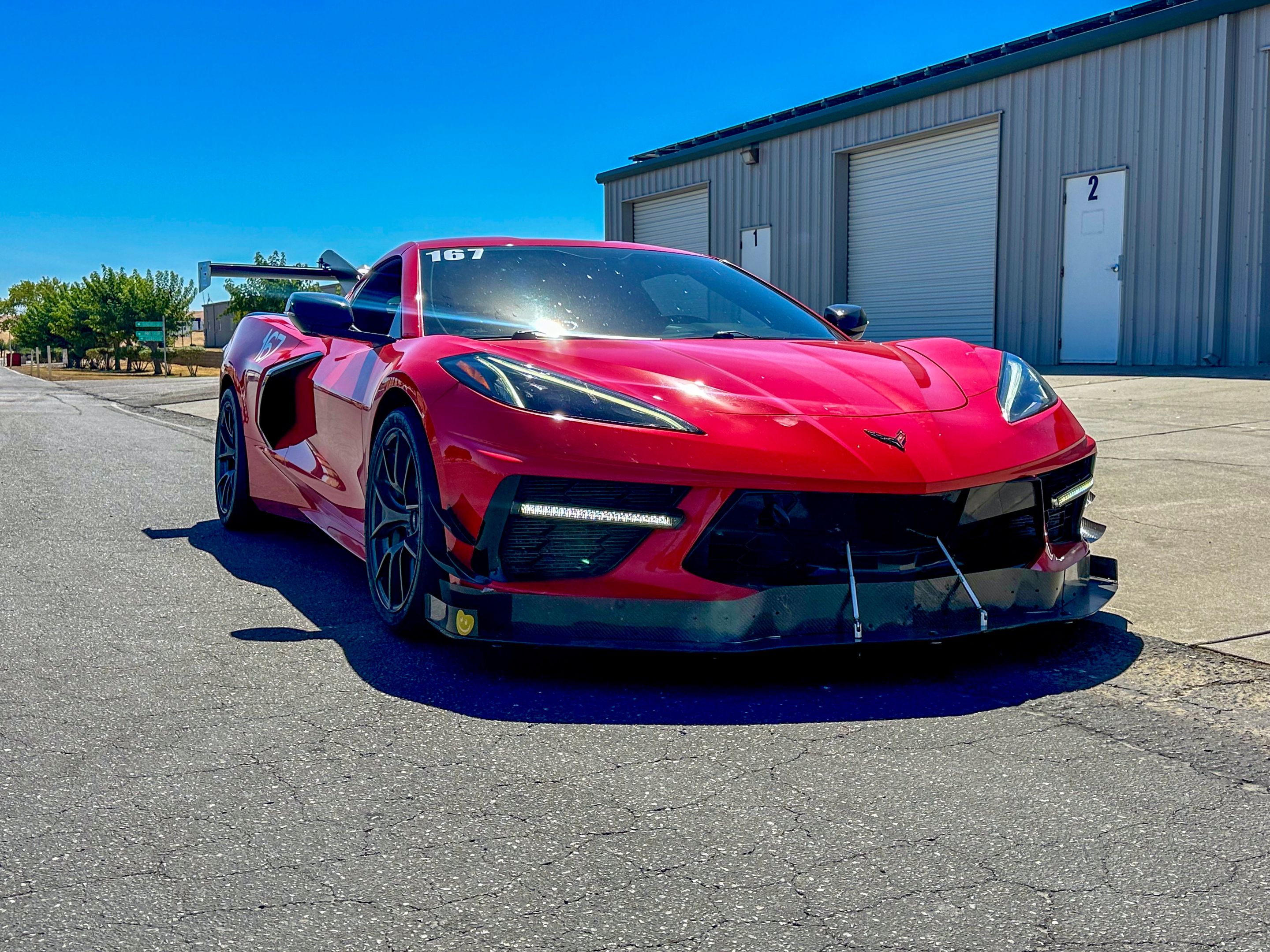 Red Chevrolet C8 Corvette Stingray/Z51 with 18"/19" VS-5RS Apex wheels in Anthracite