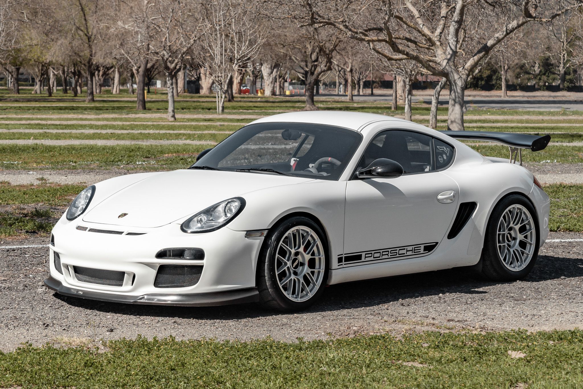White Porsche 987 Cayman R with 18" EC-7RS Apex wheels in Race Silver