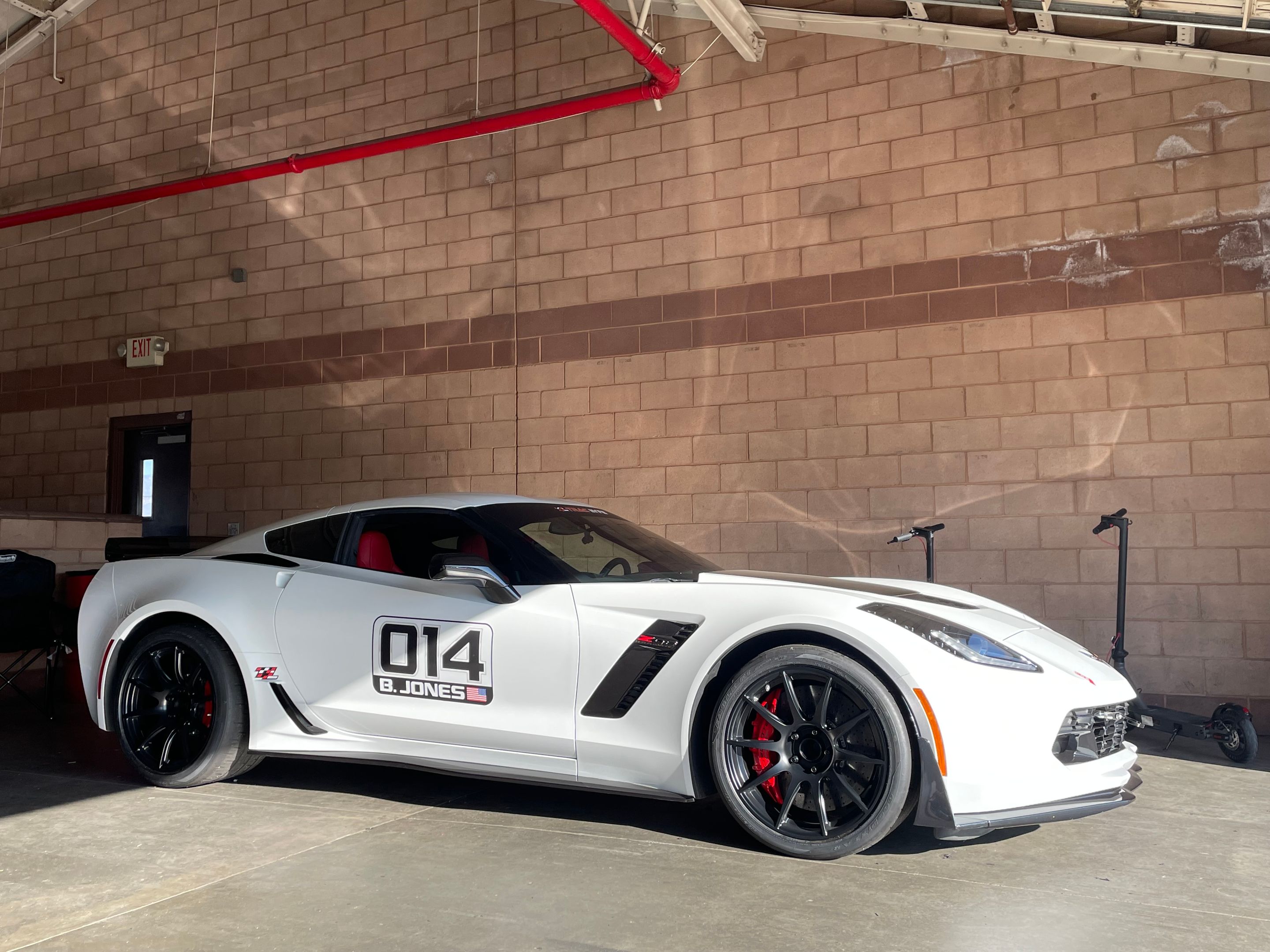 White Chevrolet C7 Corvette Z06 with 19" SM-10 Apex wheels in Satin Black