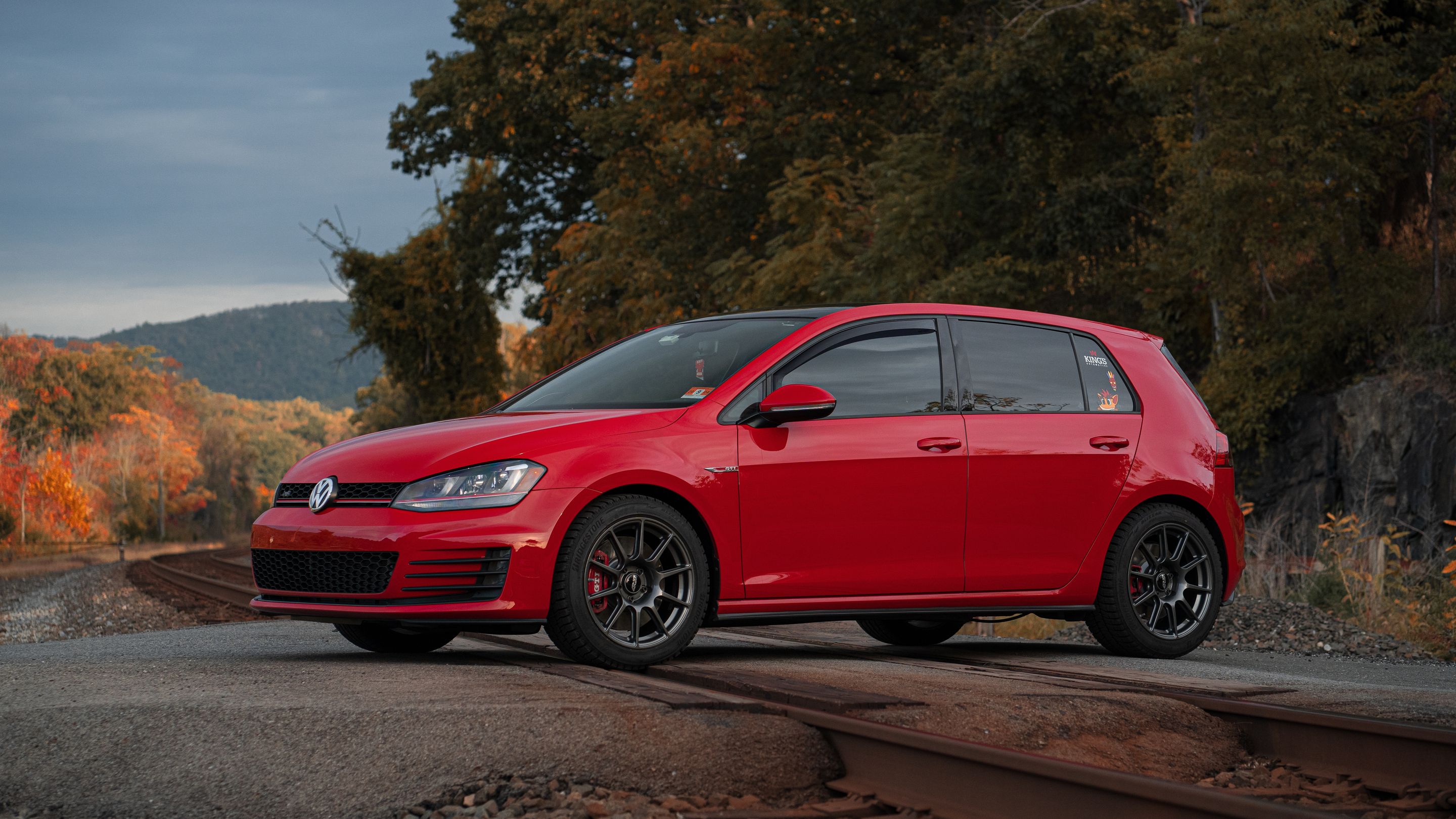 Red VW MK7 GTI with 17" SM-10 Apex wheels in Anthracite