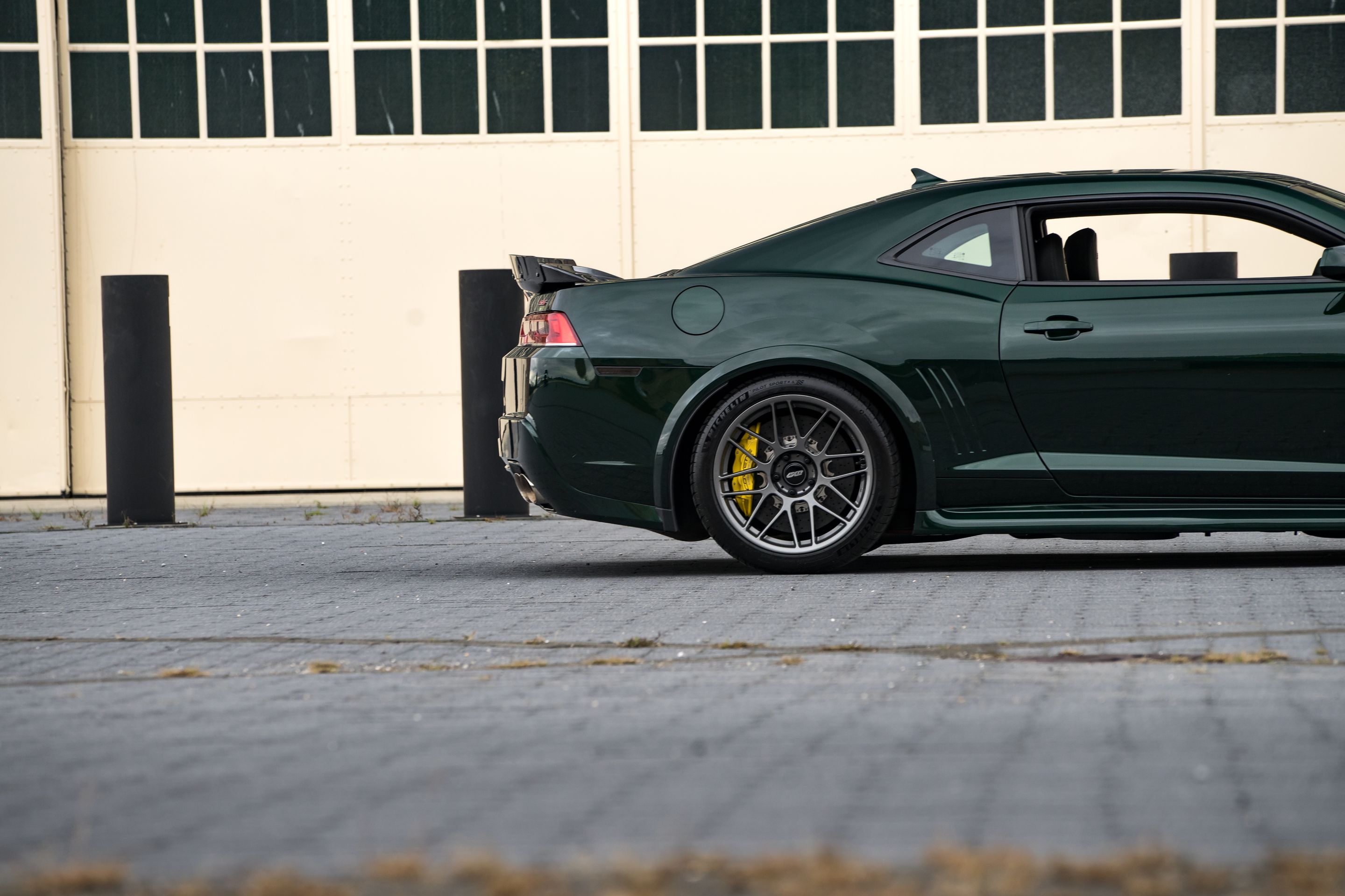 Green Chevrolet 5th Gen Camaro SS with 19" ARC-8 Apex wheels in Anthracite