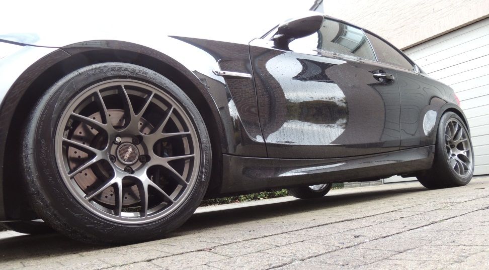 Black BMW E82 1M with 18" EC-7 Apex wheels in Anthracite