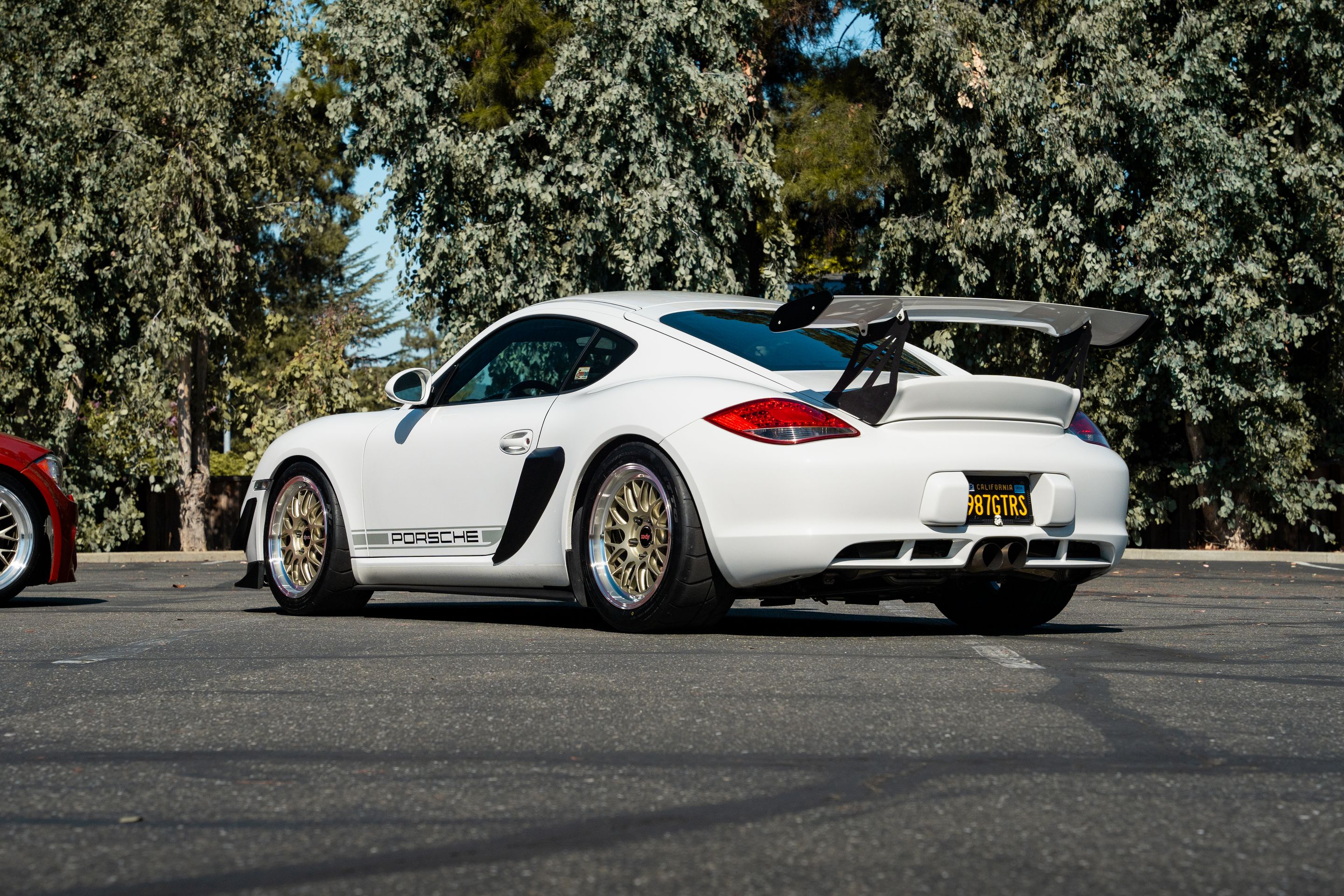 White Porsche 987 Cayman Base with 18" ML-10RT Apex wheels in Machined Lip Gloss Motorsport Gold