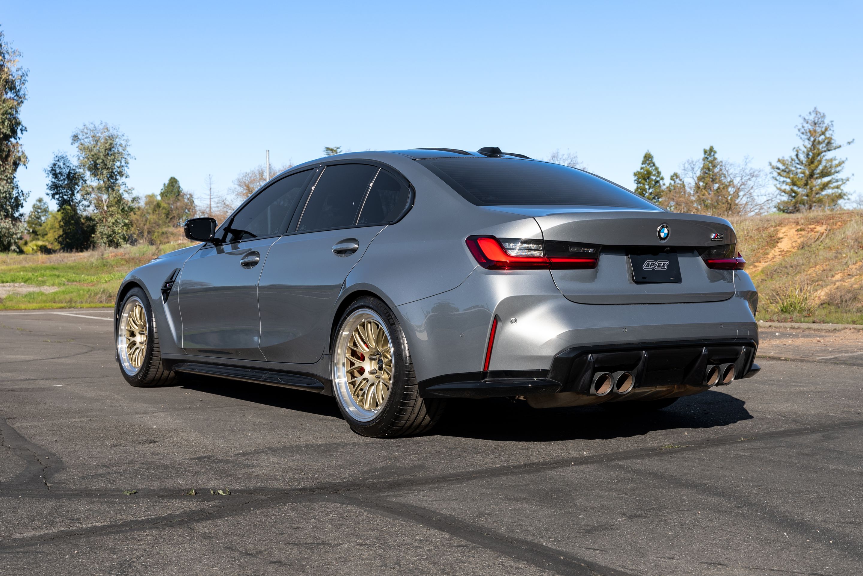 Grey BMW G80 M3 with 19" ML-10RT Apex wheels in Machined Lip Gloss Motorsport Gold