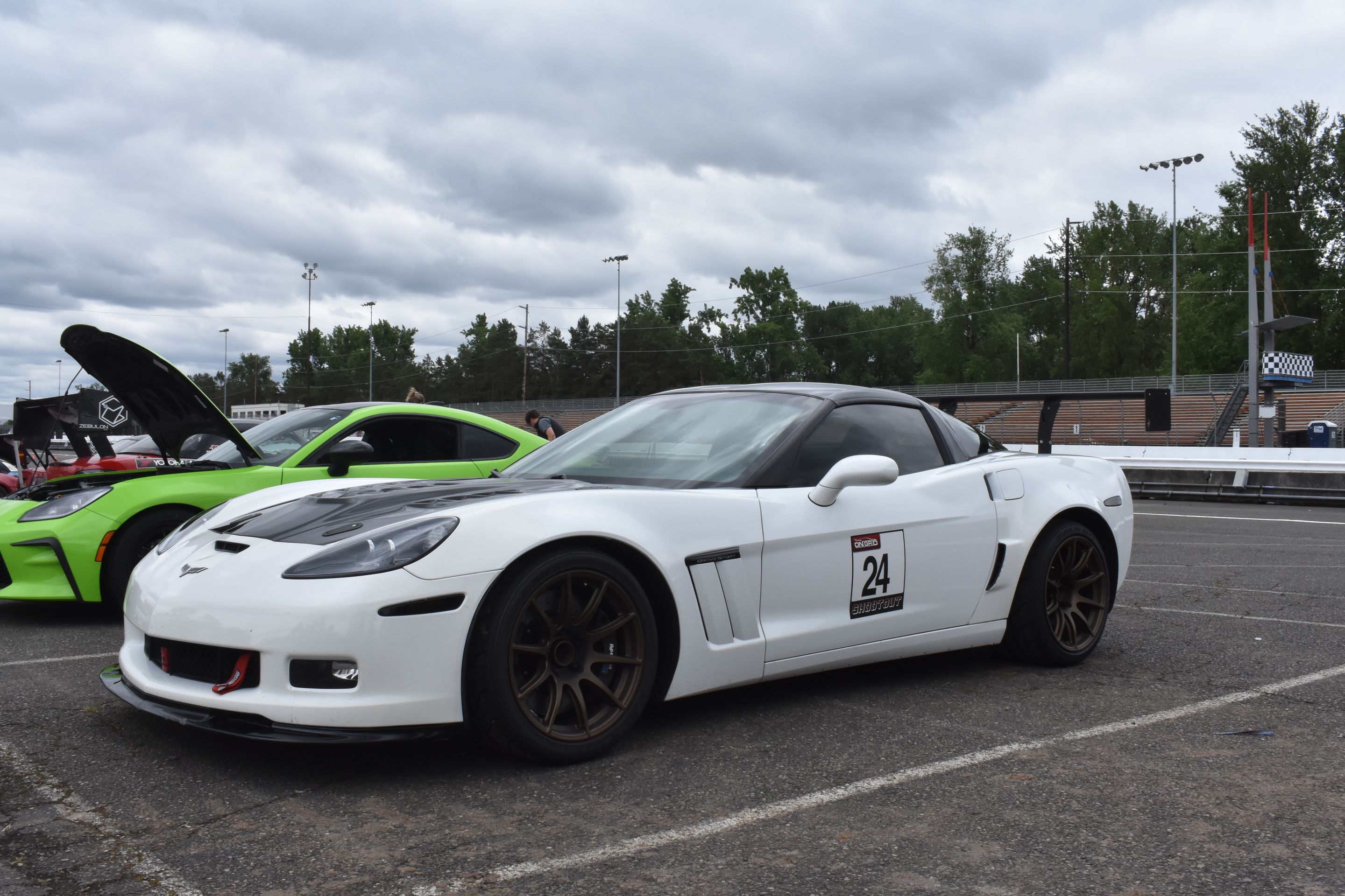 White Chevrolet C6 Corvette Grand Sport with 18" SM-10 Apex wheels in Satin Bronze