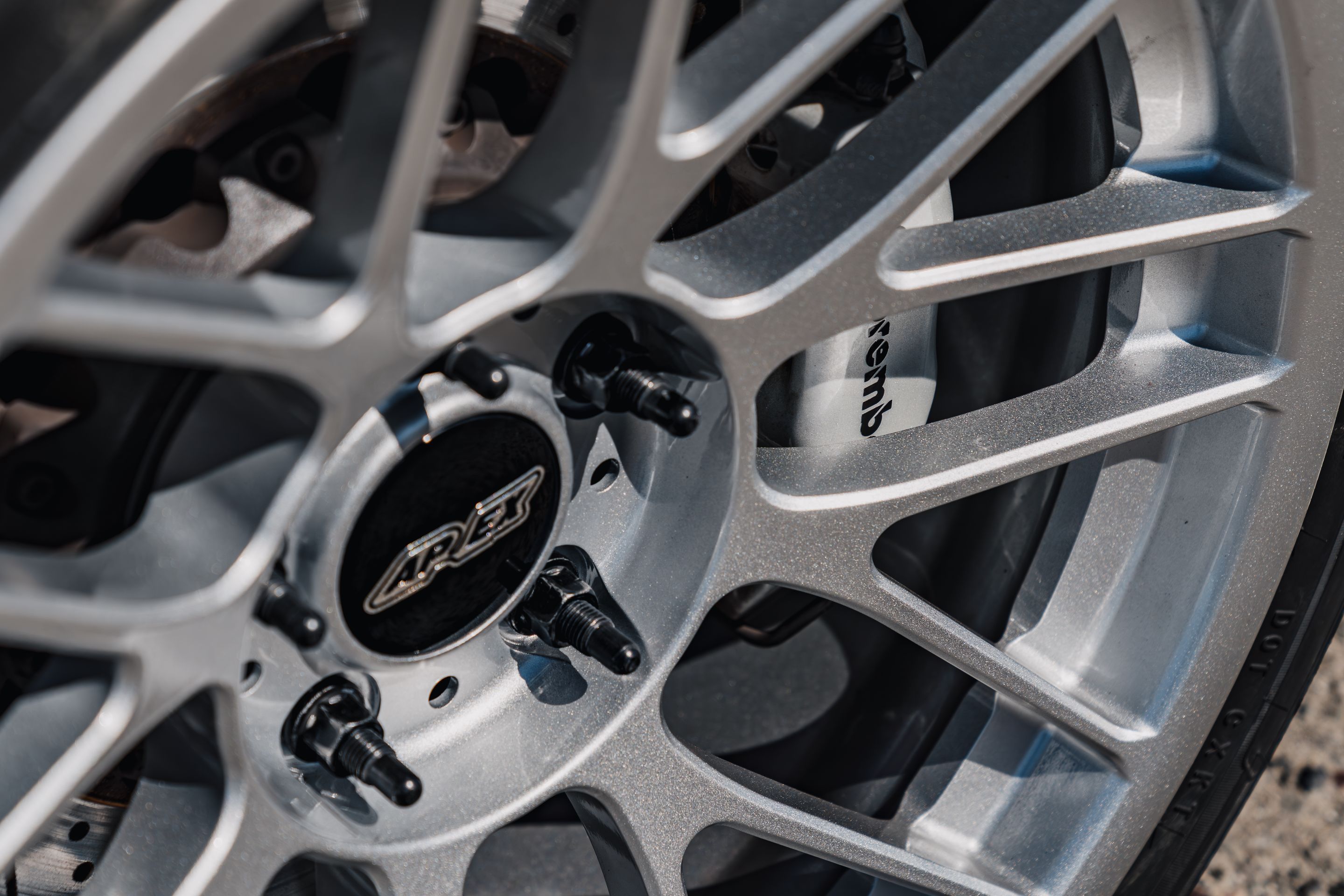 Black BMW E46 M3 with 18" ARC-8RT Apex wheels in Race Silver