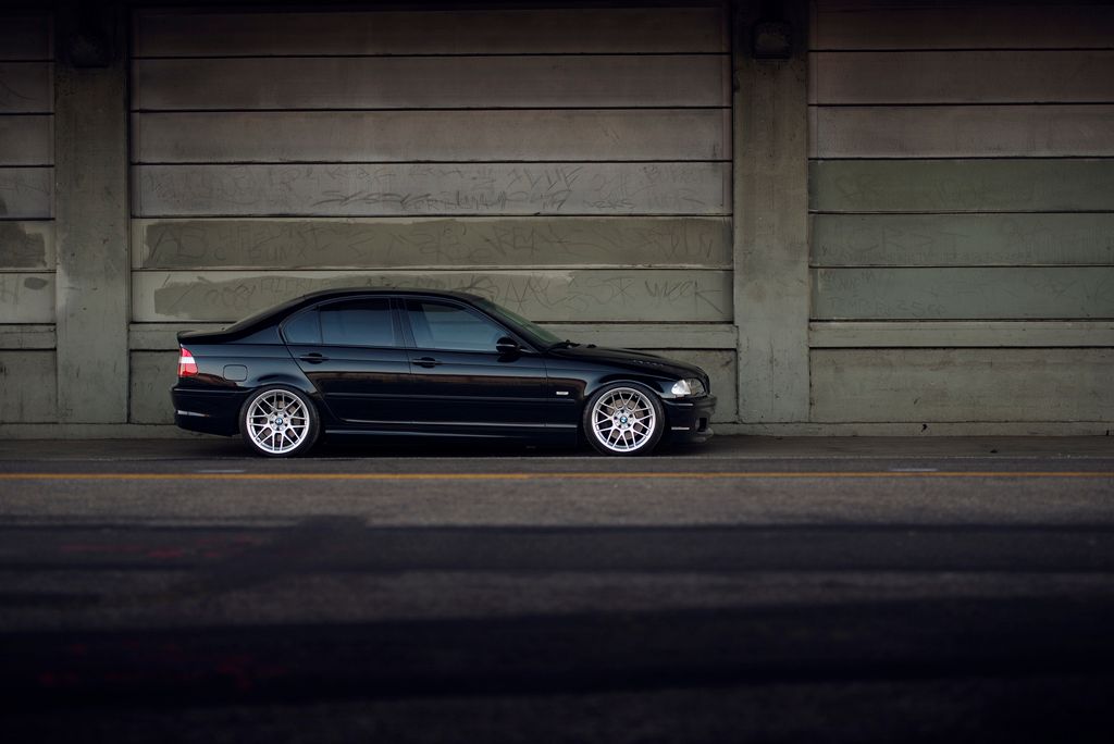 Black BMW E46 3 Series with 18" ARC-8 Apex wheels in Hyper Silver