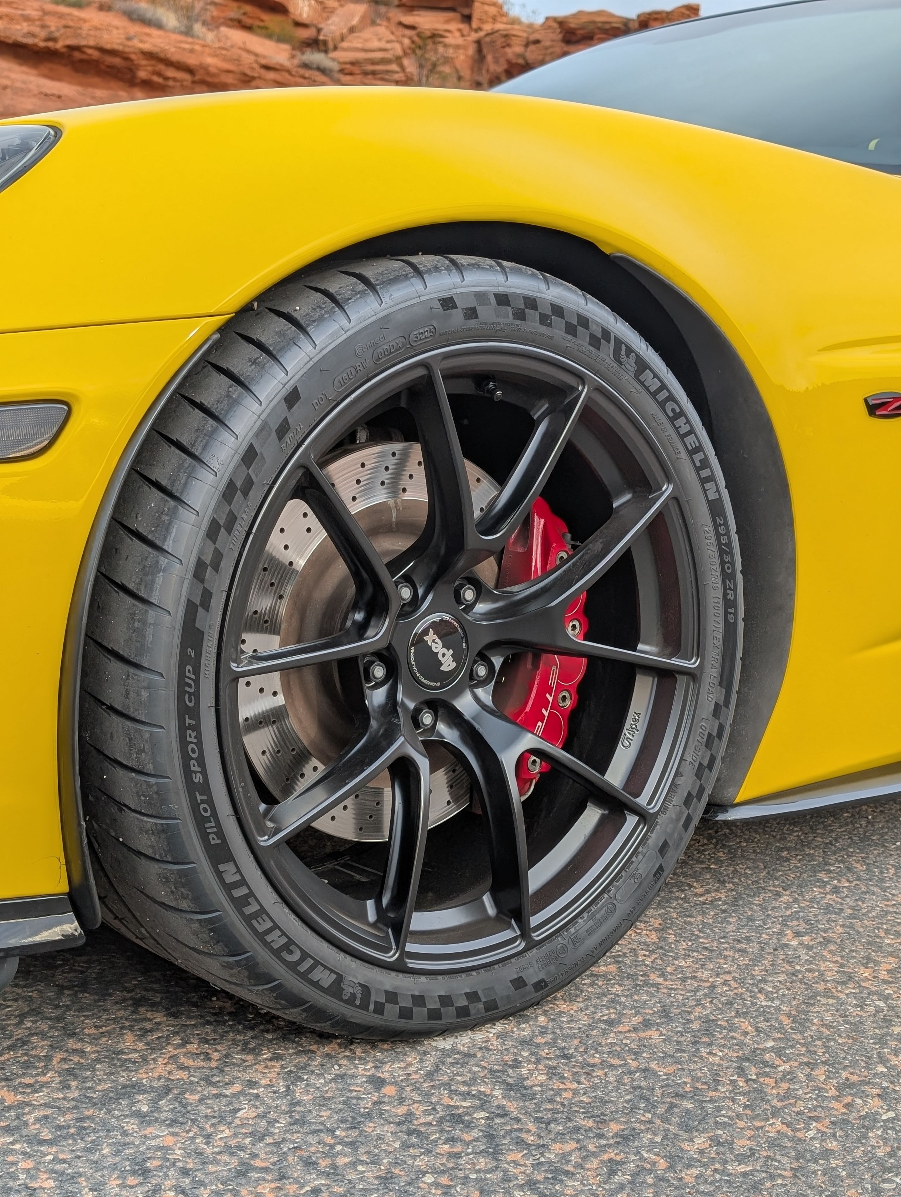 Yellow Chevrolet C6 Corvette Z06 with 19" VS-5RS Apex wheels in Satin Black