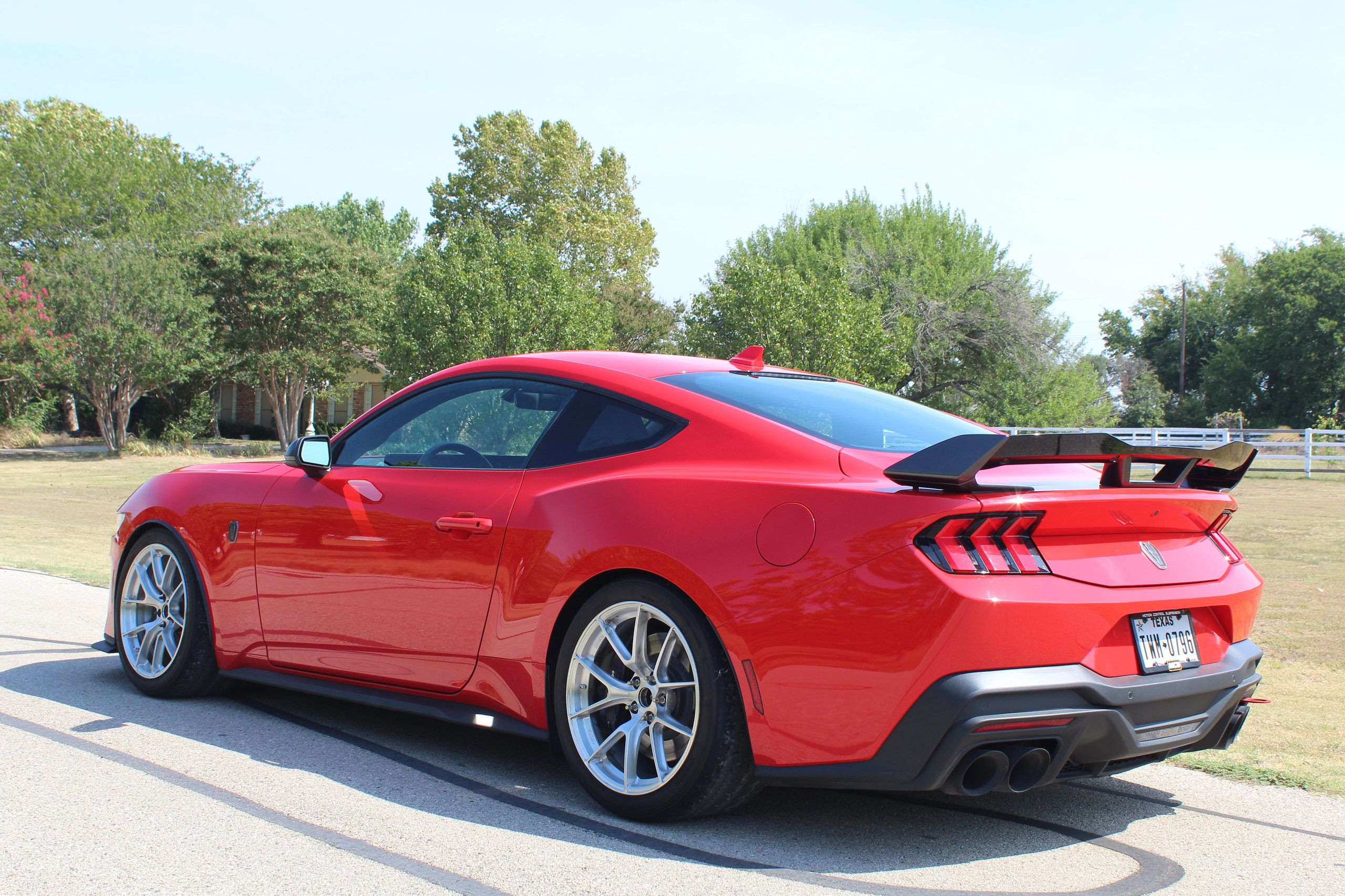 Red Ford S650 Mustang Dark Horse with 19" VS-5RS Apex wheels in Brushed Clear